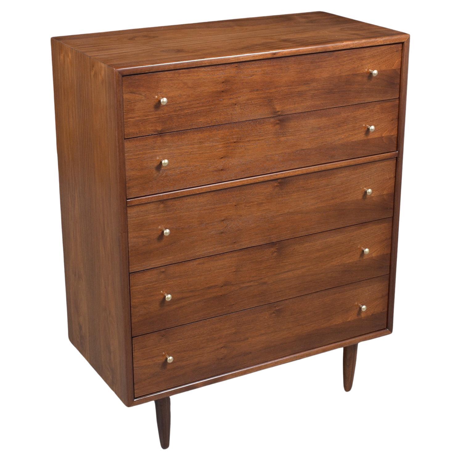 Immerse yourself in the elegance of Danish design with our meticulously restored Danish modern dresser from the 1960s. Crafted from premium mahogany wood by our skilled in-house craftsmen, this dresser epitomizes the perfect balance of form and