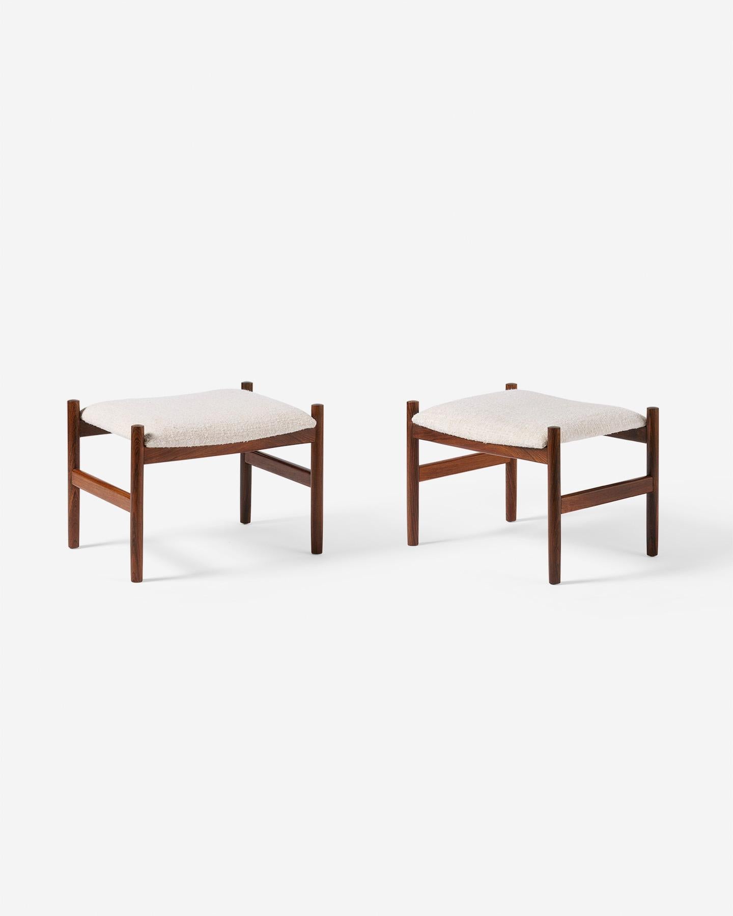 Spottrup Mobler - Upholstered Stools, c1960

A pair of classic stools produced by Spottrup Mobler in The frames are made from exquisite rosewood that has been refinished by our team of restorers in London. The new padded seats have been upholstered