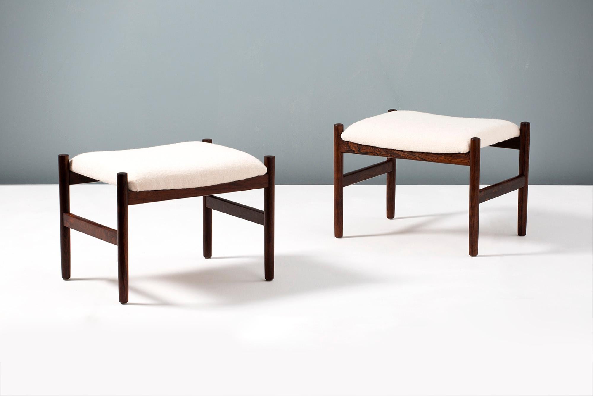 Pair of vintage ottomans by Danish producer Spottrup Mobler made from exotic rosewood. The seats have been reupholstered in luxurious pure-wool fabric from Chase Erwin UK. Originally produced, circa 1960.