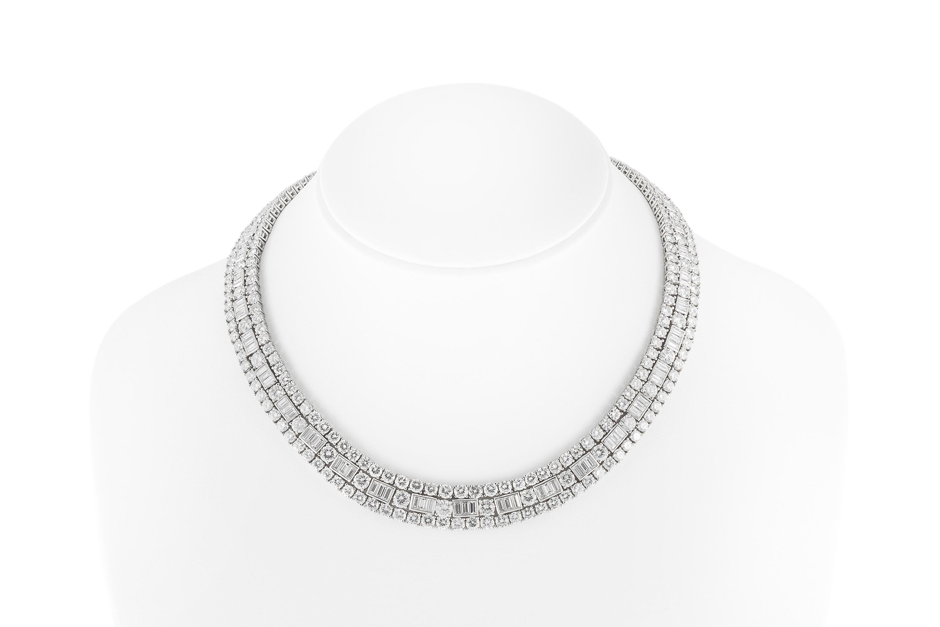 Finely crafted in platinum with Round Brilliant and Baguette cut Diamonds weighing a total of approximately 48.00 carats.
Signed by David Webb
Circa 1960s
15 inches long
Comes with its Certificate of Authenticity