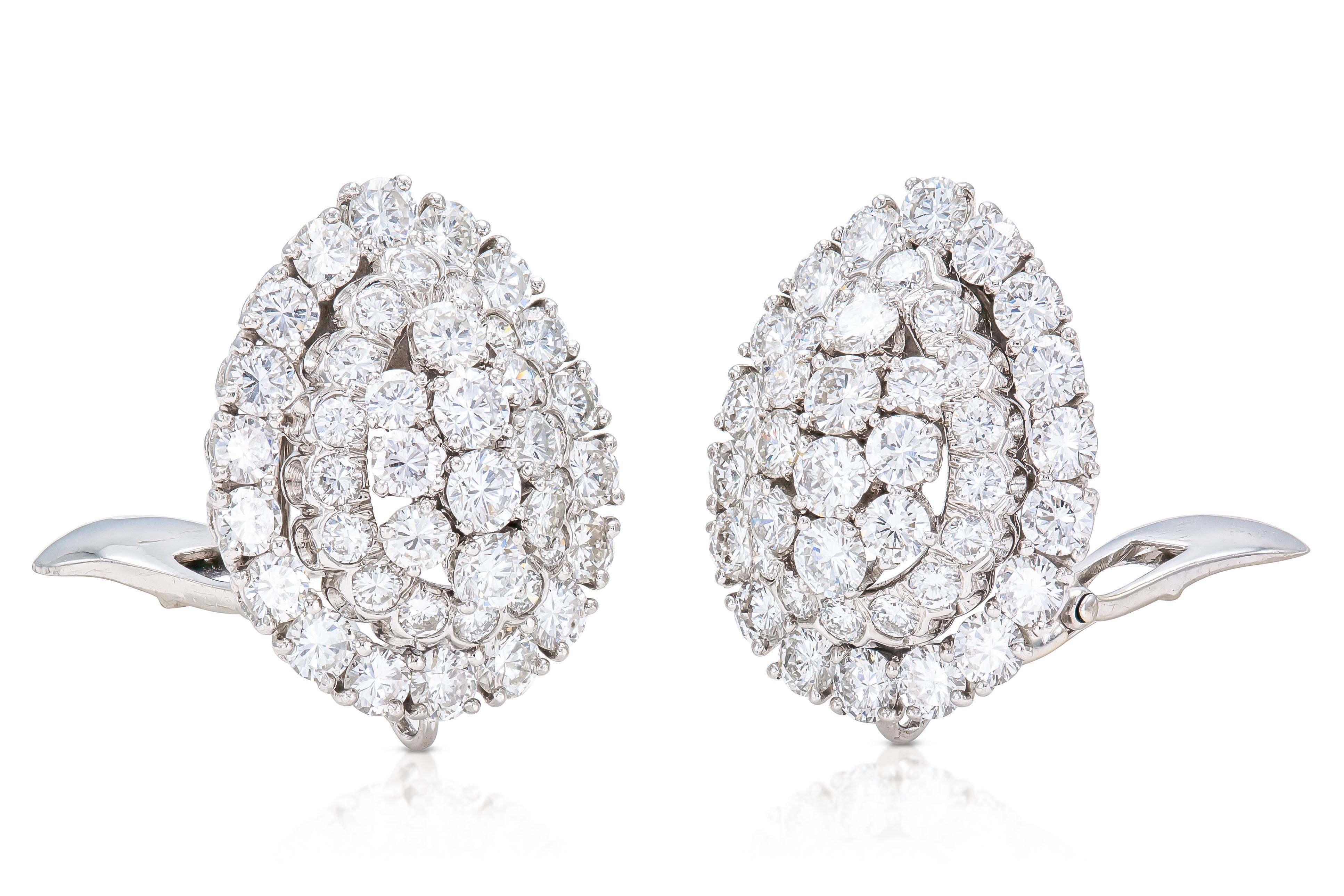 Finely crafted in platinum featuring Round Brilliant cut Diamonds weighing a total of approximately 8.00 carats. 
Signed by David Webb
Circa 1960s
1 x 3/4 inch