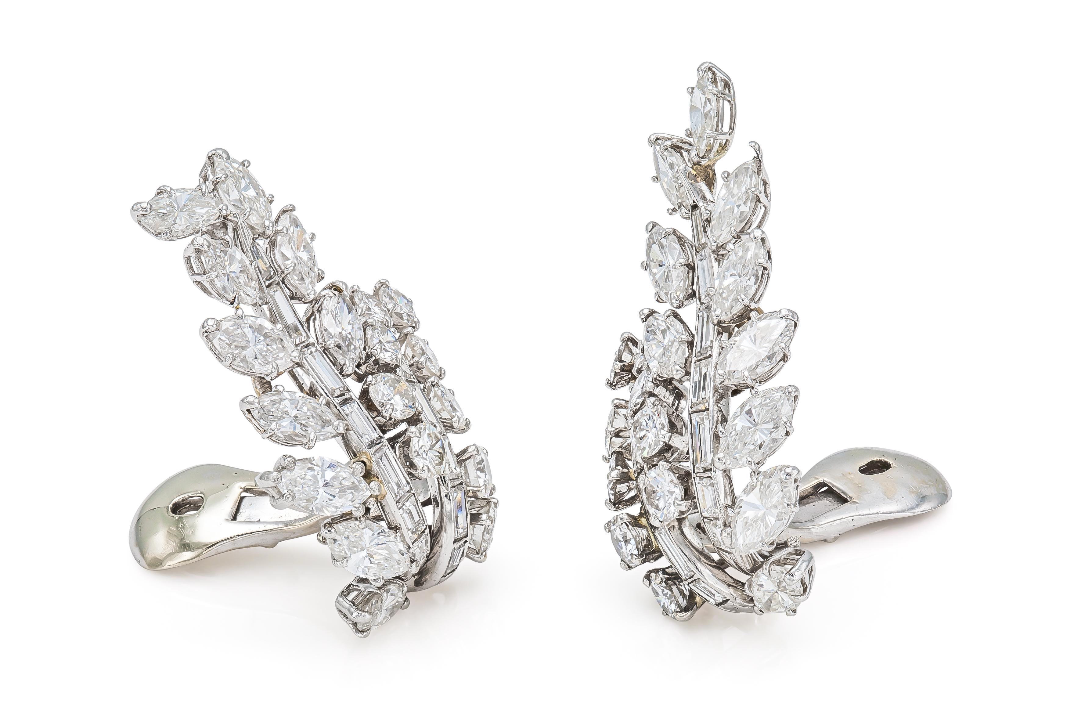 Finely crafted in platinum with Marquise, Baguette, and Round Brilliant cut Diamonds forming a leaf shape.
Signed by David Webb
Circa 1960s
1 3/8 x 3/4 inches