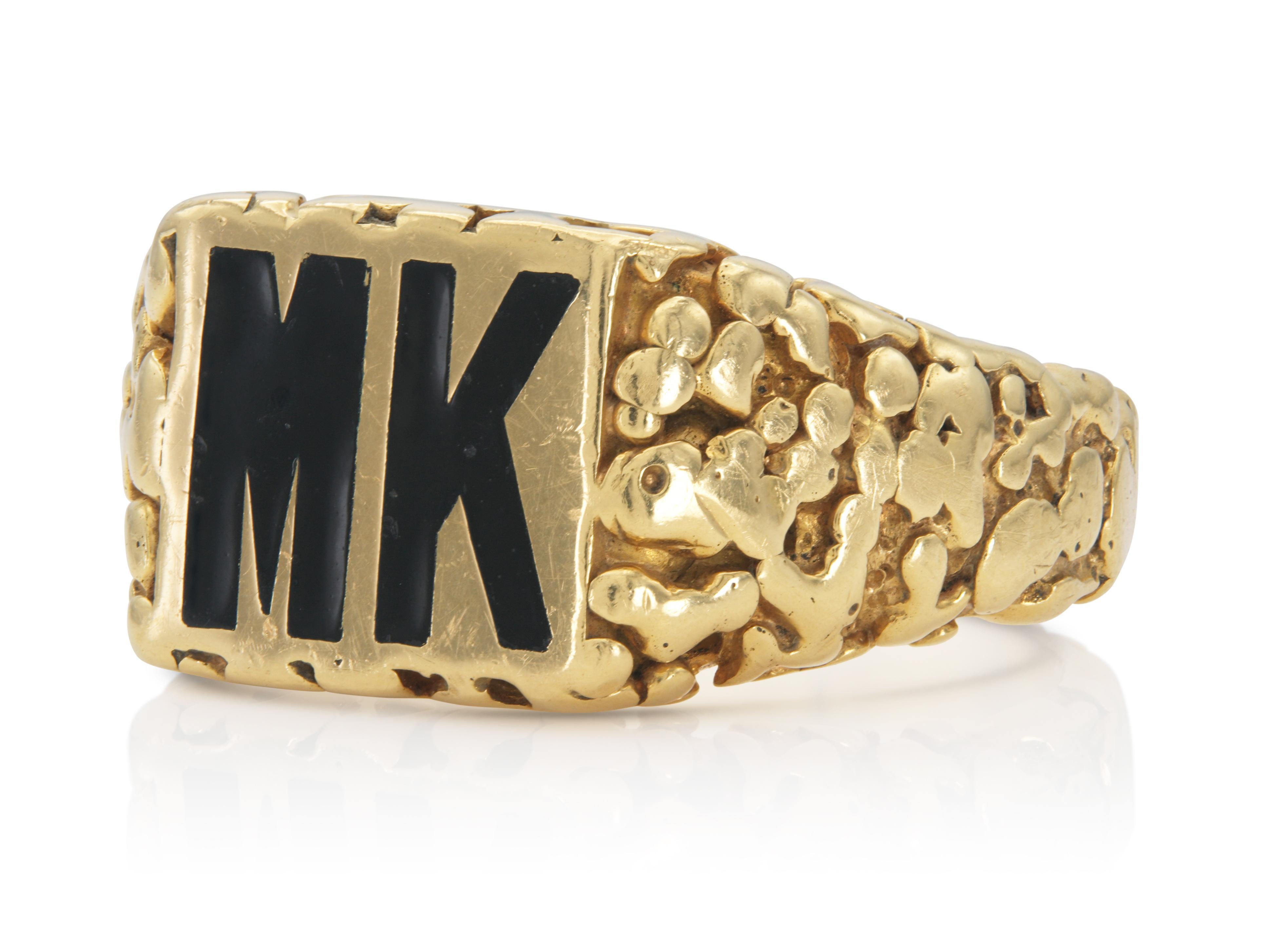 Finely crafted in 18k yellow gold and black enamel making up the initials M and K.
Signed by David Webb
Circa 1960s
Size 10, resizable