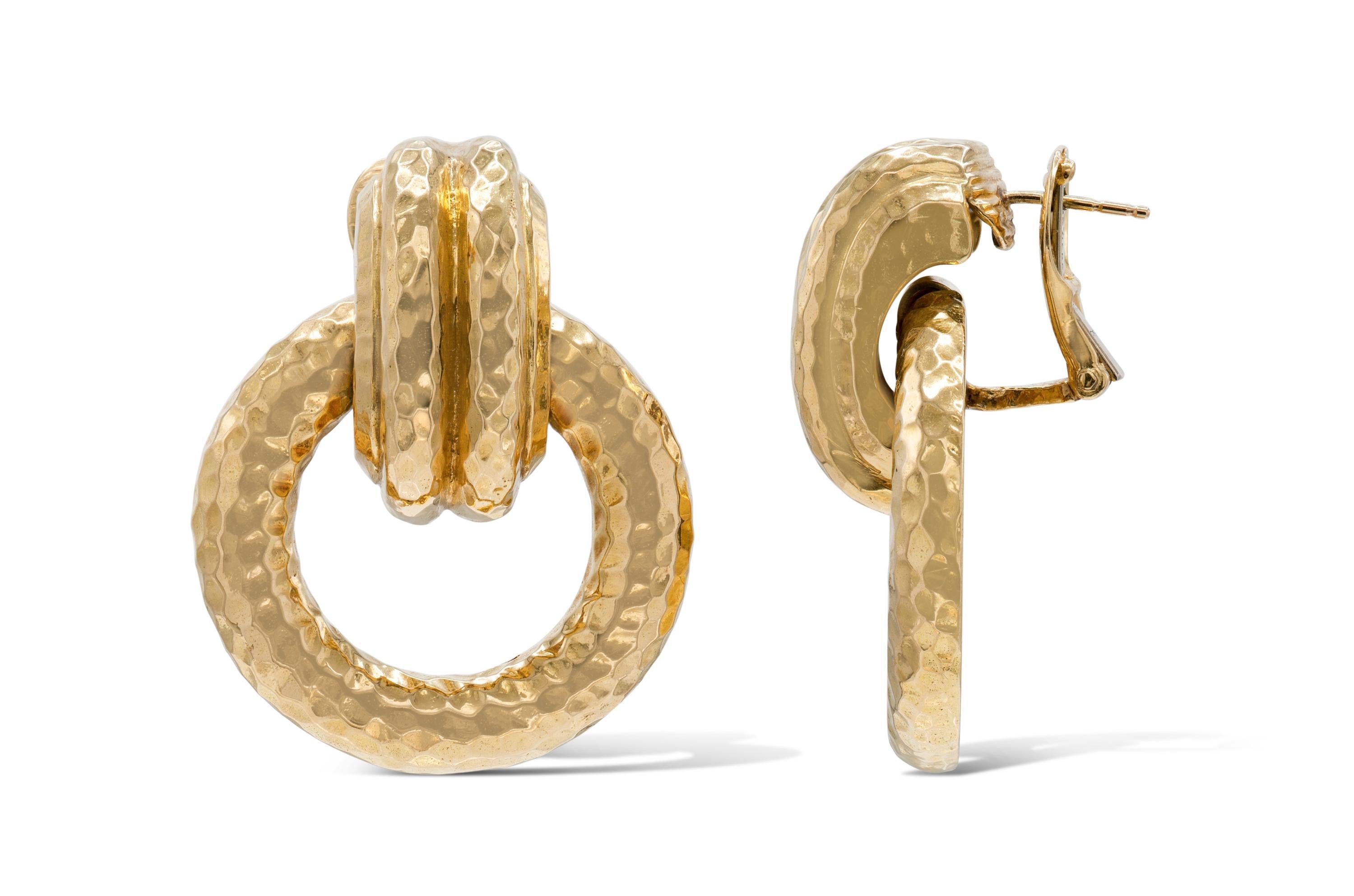 Finely crafted in 18k hammered yellow gold.
Signed by David Webb
Circa 1960s
1 3/4 x 1 1/4 inches