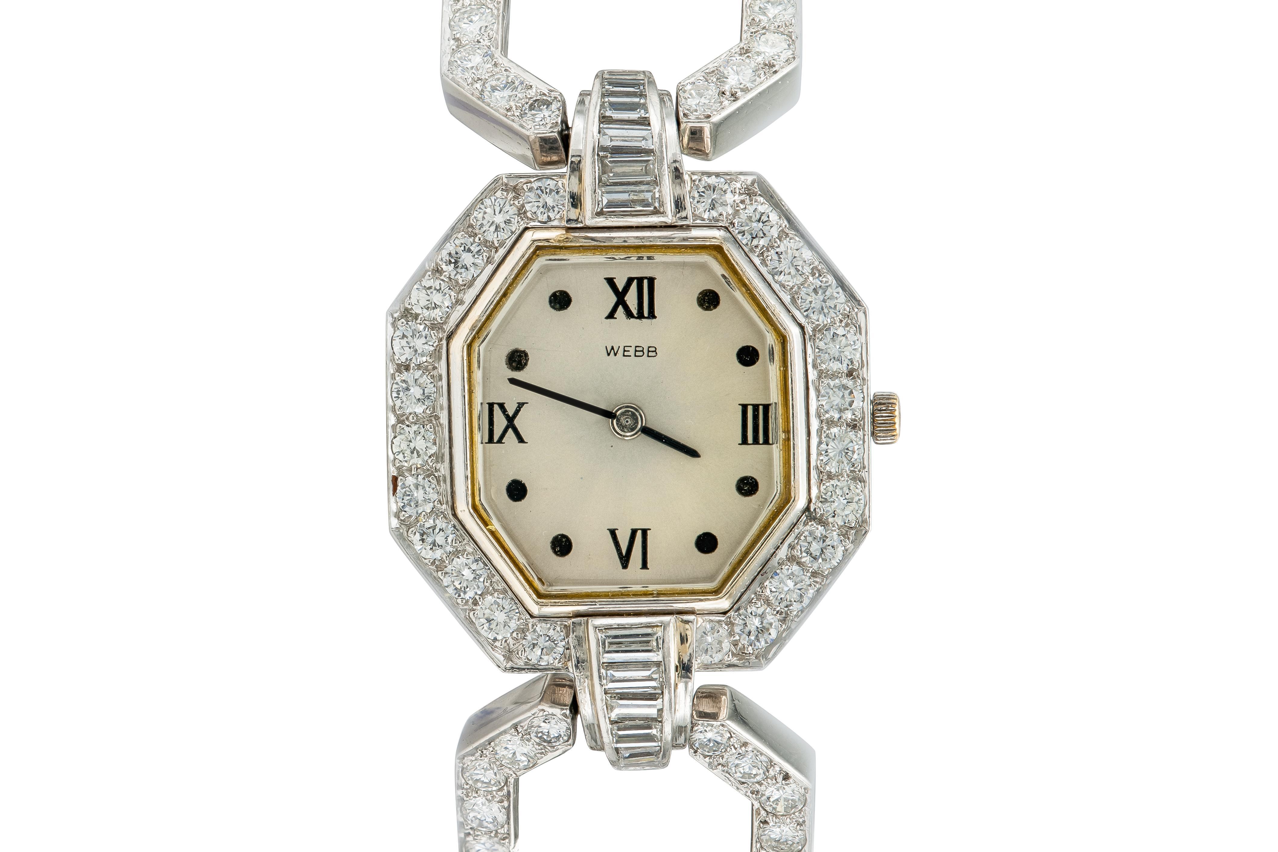 Finely crafted in 18k white gold with Round Brilliant cut Diamonds weighing approximately a total of 17.00 carats, and Baguette cut Diamonds weighing approximately a total of 1.00 carat.
Signed by David Webb
Circa 1960s