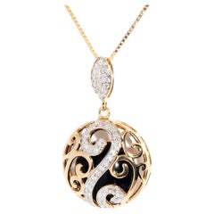 Vintage 1960s Diamond and Onyx "S" Pendant with 9 Carat Yellow Gold Chain