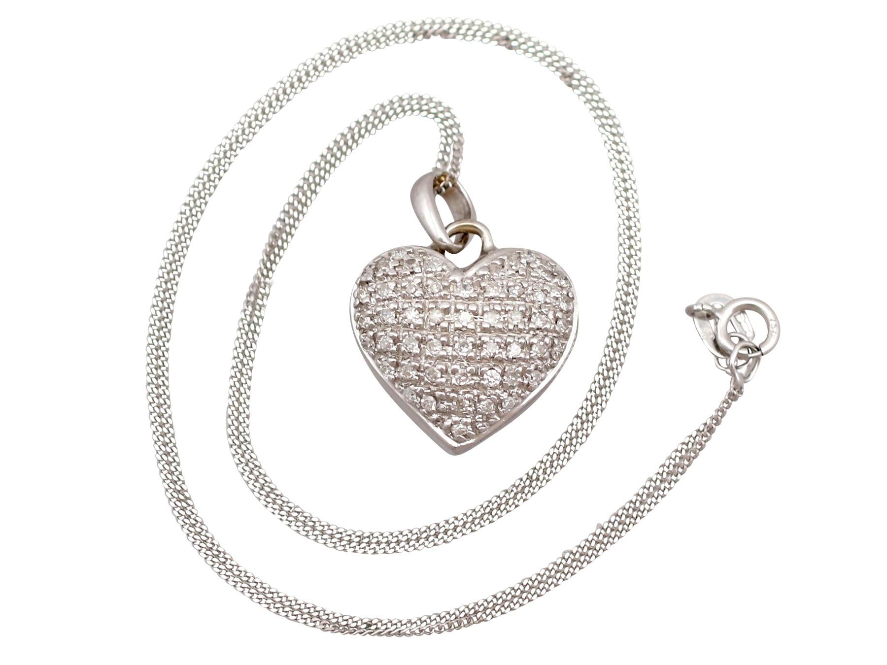 An impressive vintage 1960s 0.25 carat diamond and 18 karat white gold heart shaped pendant; part of our diverse diamond jewelry and estate jewelry collections.

This fine and impressive diamond heart pendant has been crafted in 18k white gold.

The