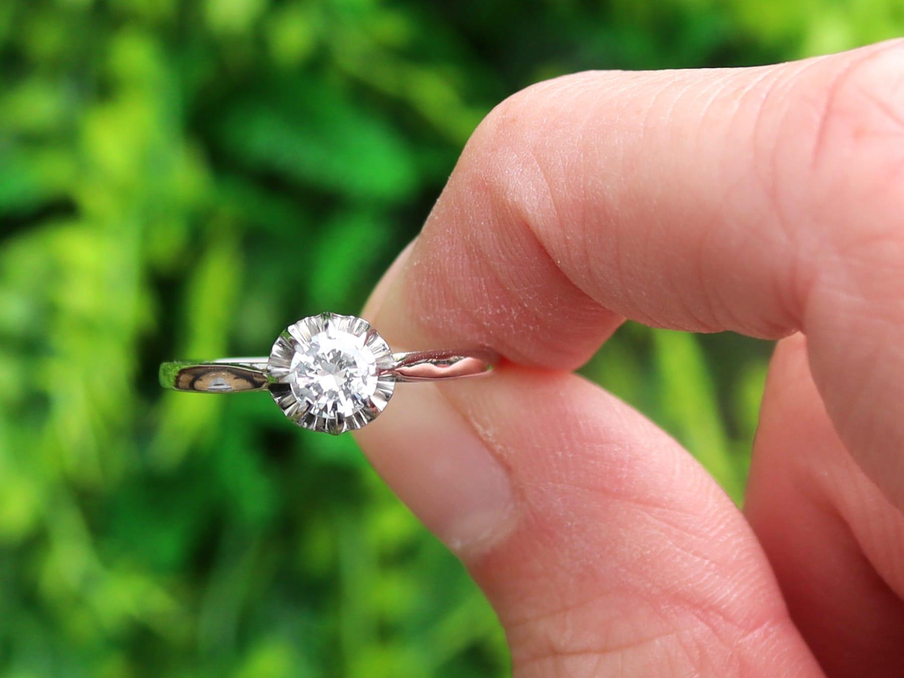 A fine vintage 0.37 carat diamond and 18 karat white gold solitaire ring; part of the diverse vintage engagement ring collections.

This fine vintage diamond solitaire ring has been crafted in 18k white gold.

The pierced decorated, elevated basket