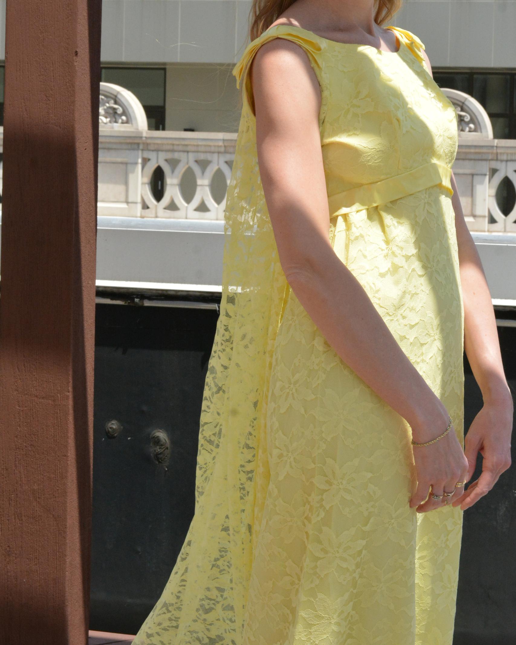 This incredible vintage 1960s lace column dress is giving Bridgerton in the best way possible, with the empire waist cut, and 