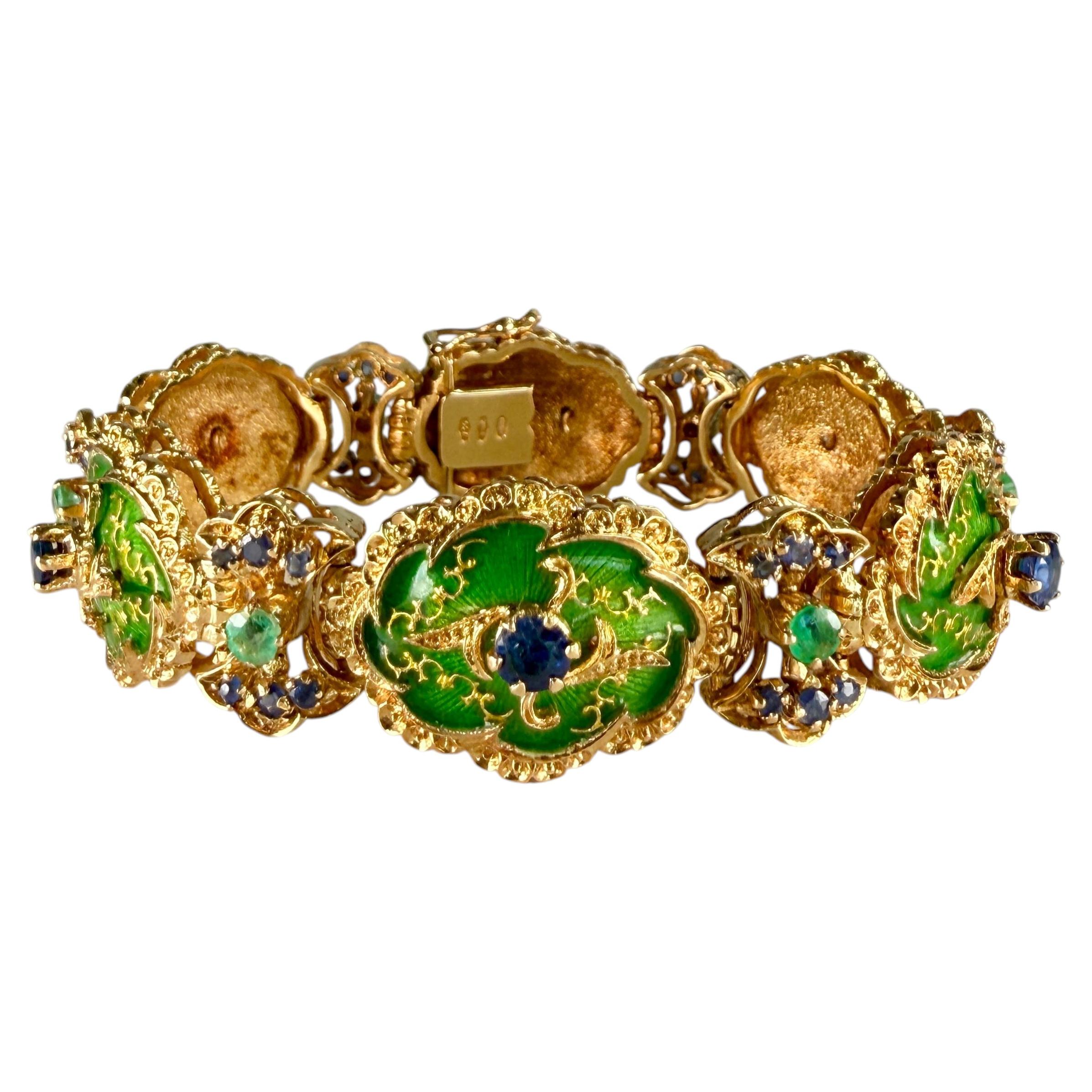 Bracciale vintage degli anni '60 con zaffiri e smeraldi smaltati, in oro giallo 18 carati