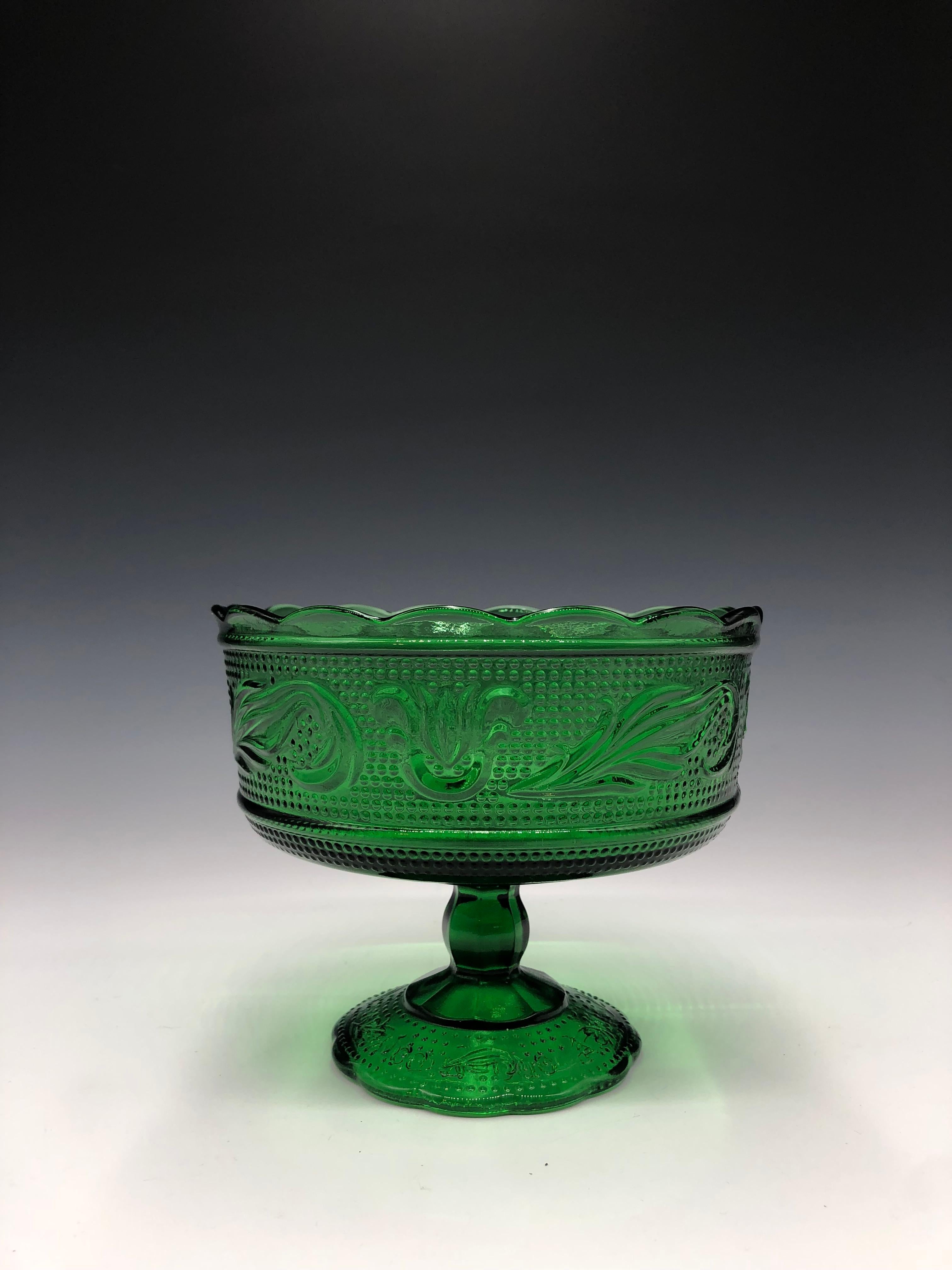 Rich emerald green mid-century modern E. O. Brody Co. pressed Glass Candy / Compote Dish with thick Dutch Floral tulip and leaf pattern and ruffle rim. Made in Cleveland, Ohio, Model M6000.

Size: 5.5