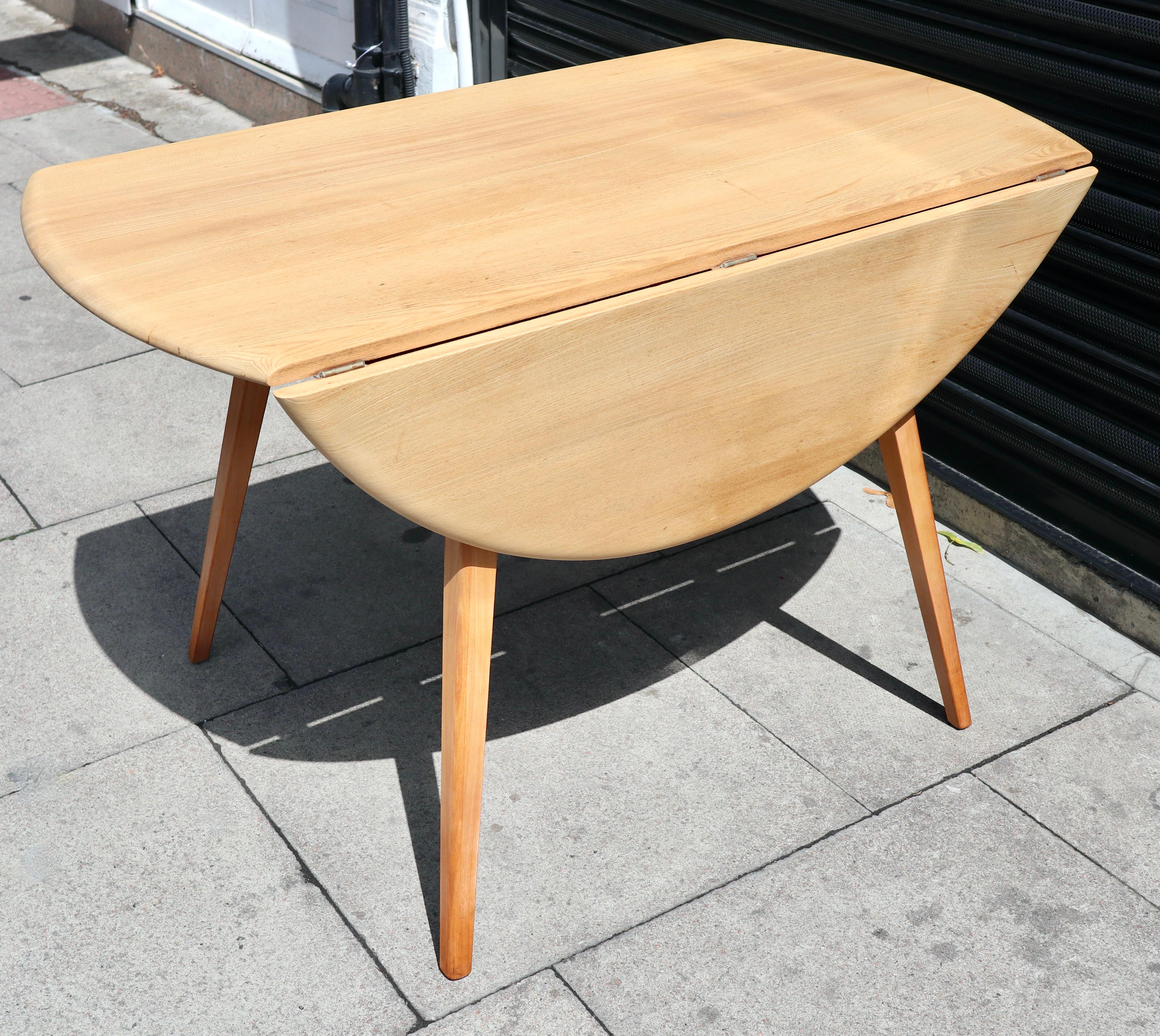English Vintage 1960s Ercol drop leaf Elmwood and Beech dining table For Sale