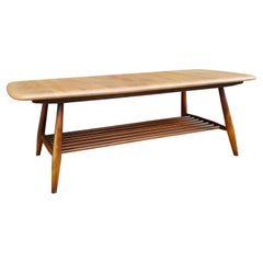 Vintage 1960s  Ercol elm coffee table with magazine shelf