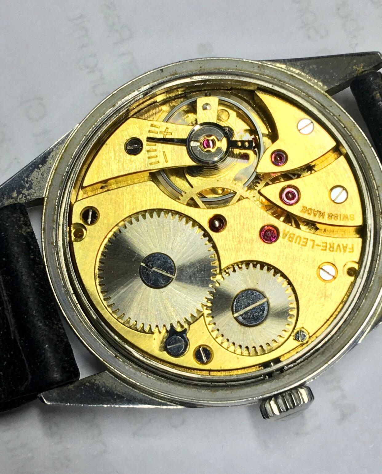 Vintage 1960s Favre Leuba Geneve acier inoxydable montre mécanique pour hommes Unisexe en vente