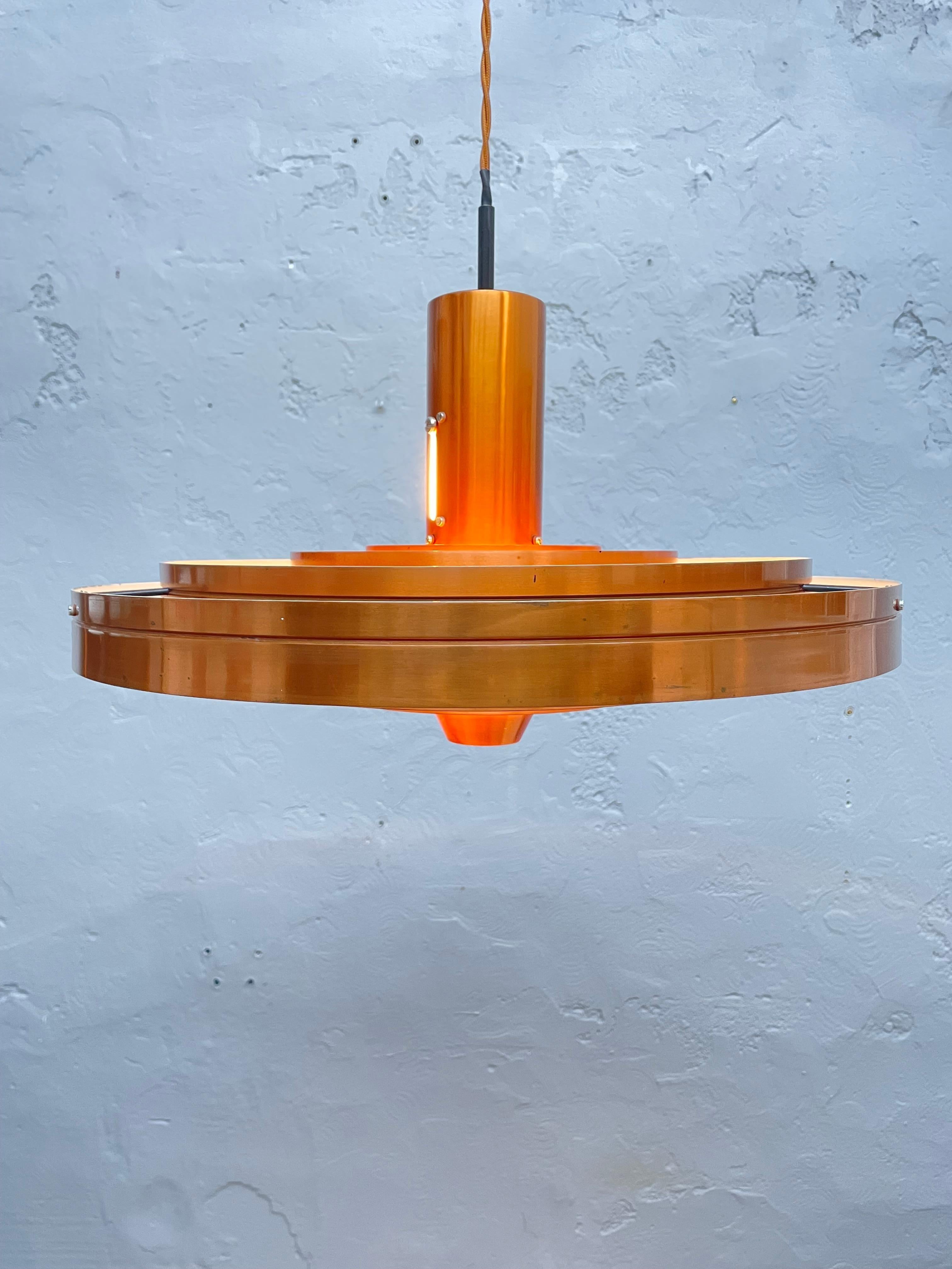 Iconic and rare pendant designed by Sophus Frandsen in 1963 for Fog & Mørup. The Fibonacci model is one of the most recognizable designs and is becoming increasingly rare to find.especially in copper. 
A stunning and complex lamp that combines