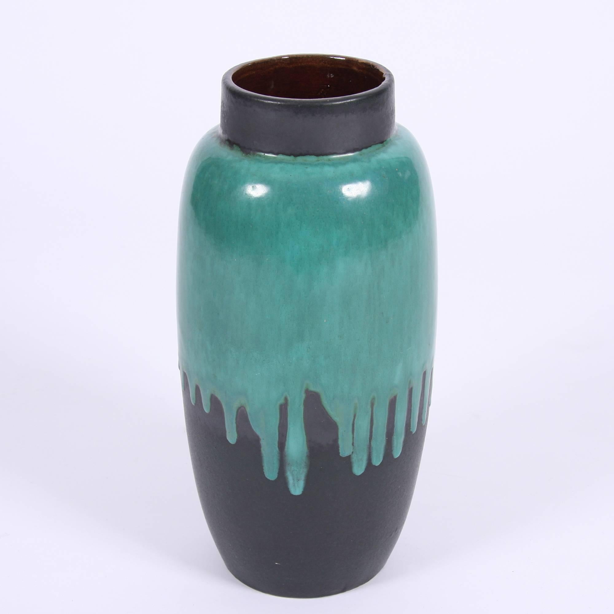 German, circa 1960

A fabulous 1960s West German ceramic vase with a vivid 'drip' effect glazed finish. Marked on base.