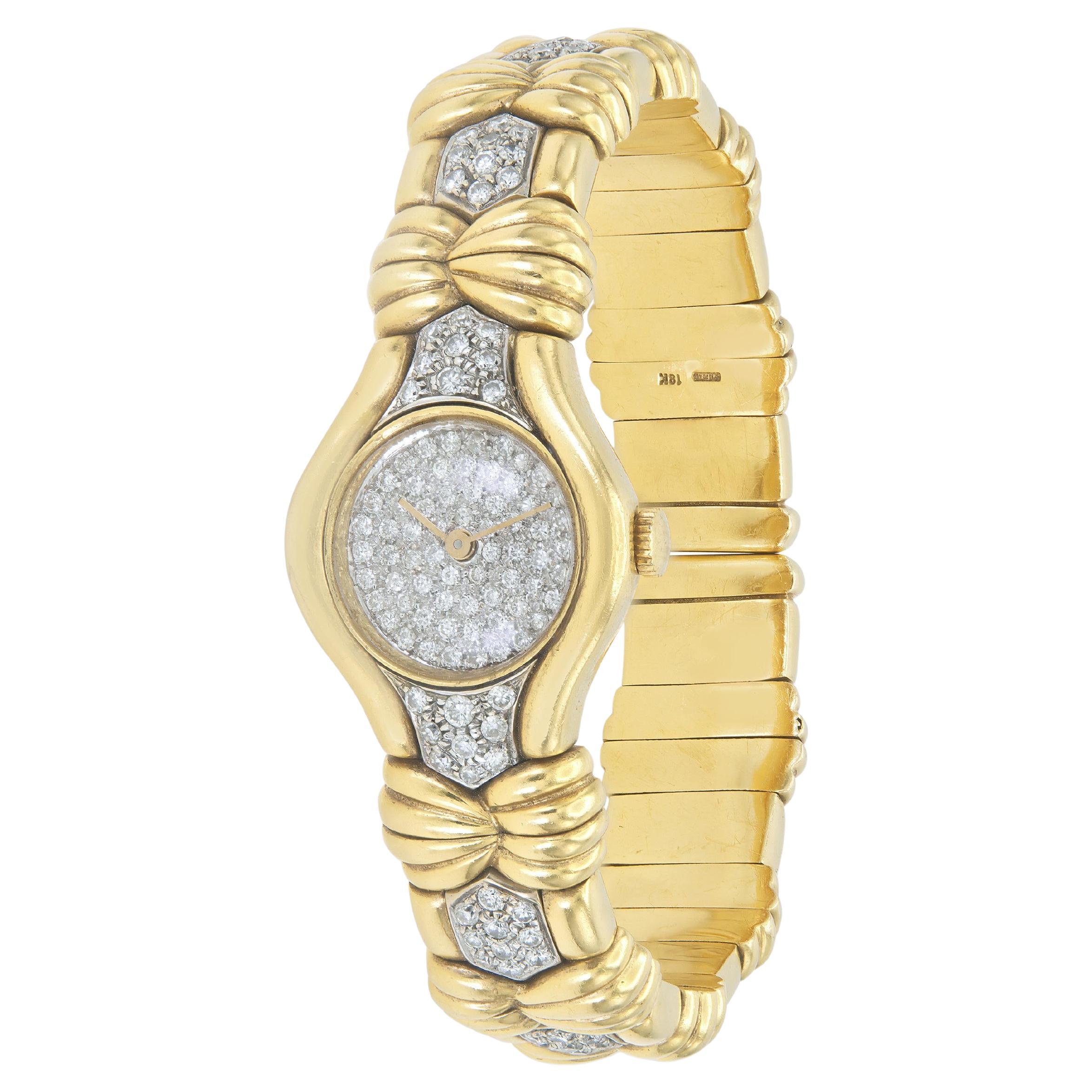 Brazalete de reloj vintage de oro y diamantes de los años 60