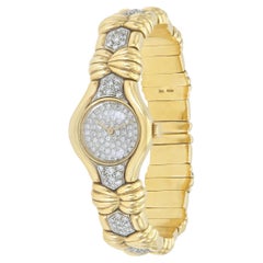 Brazalete de reloj vintage de oro y diamantes de los años 60