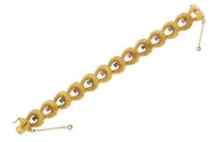 Vintage 1960s Gold Bracelet with Rubies and Sapphires