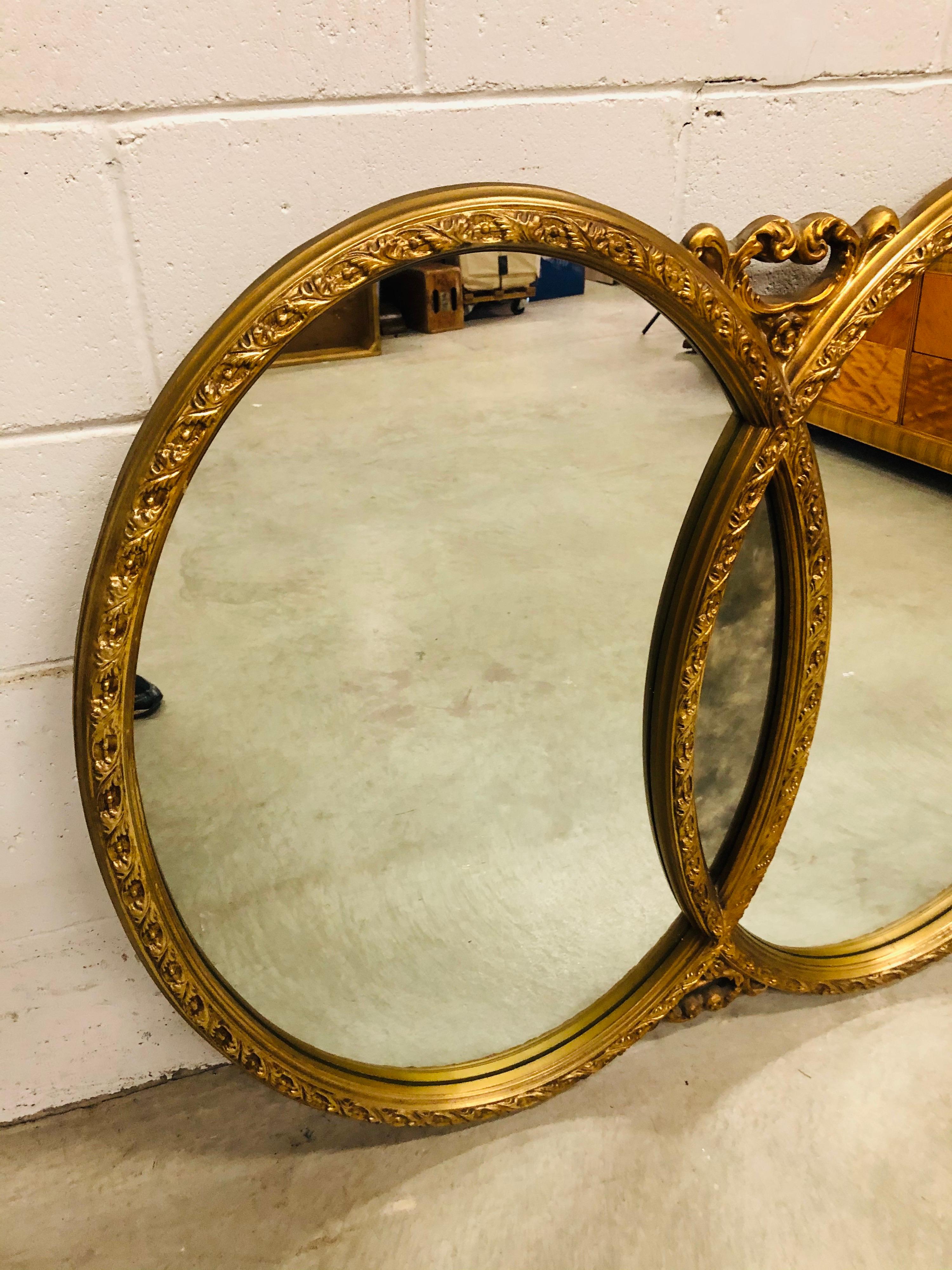 Vintage Mid-Century Modern 1960s gold framed three section wall mirror with floral accents. No marks. Hardware included.