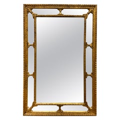 Specchio neoclassico vintage del 1960 in legno intagliato a foglia d'oro