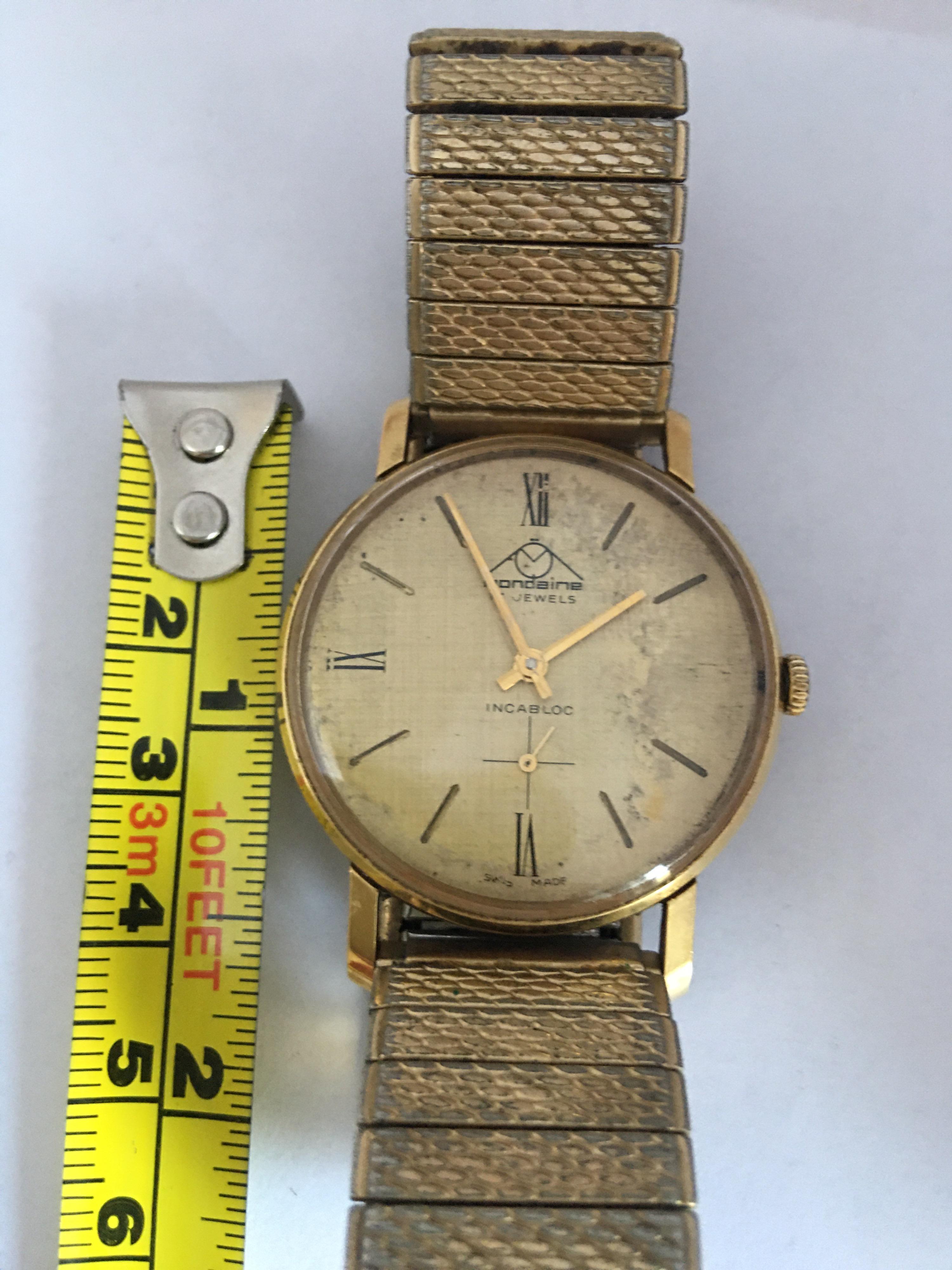 Vintage 1960s Gold-Plated and Stainless Steel Back Mechanical Swiss Watch For Sale 4
