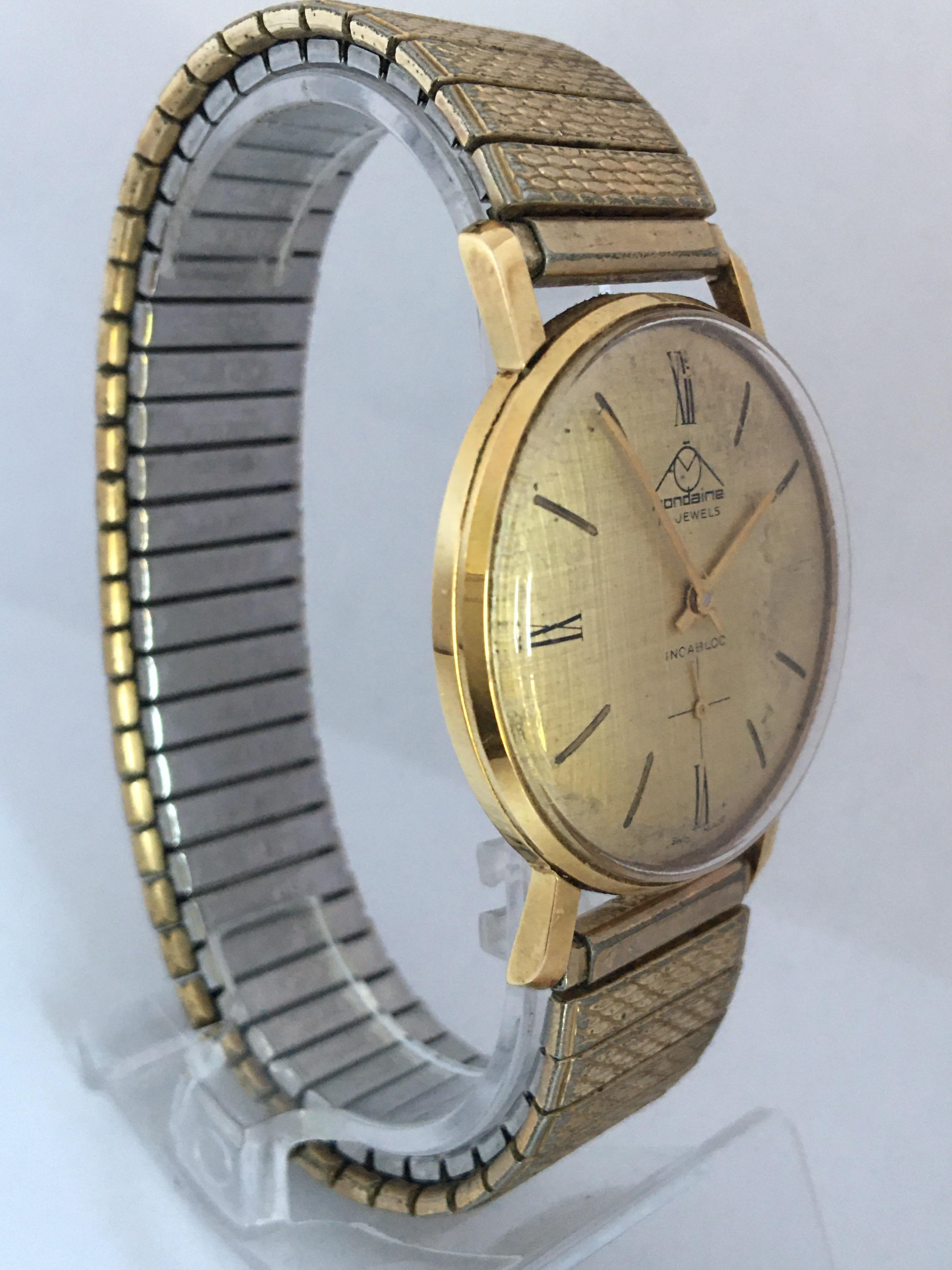 Vintage 1960s Gold-Plated and Stainless Steel Back Mechanical Swiss Watch For Sale 7