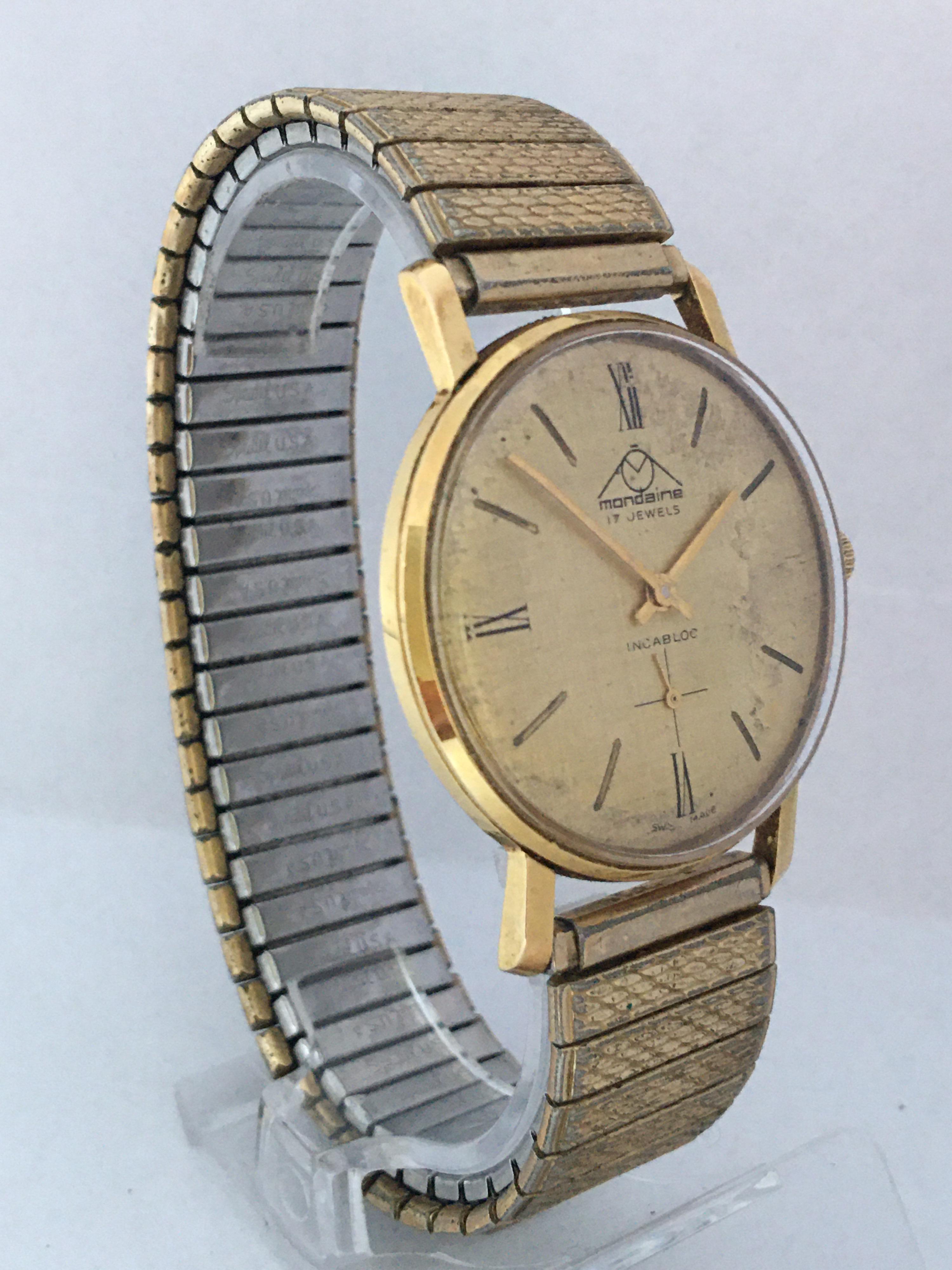 This charming pre-owned vintage hand-winding watch is working and it is running well. some deterioration on the gold plate dial as shown. Its 6.5 inches gold plated watch and stainless steel back has aged and tarnished as shown. 

Please study the