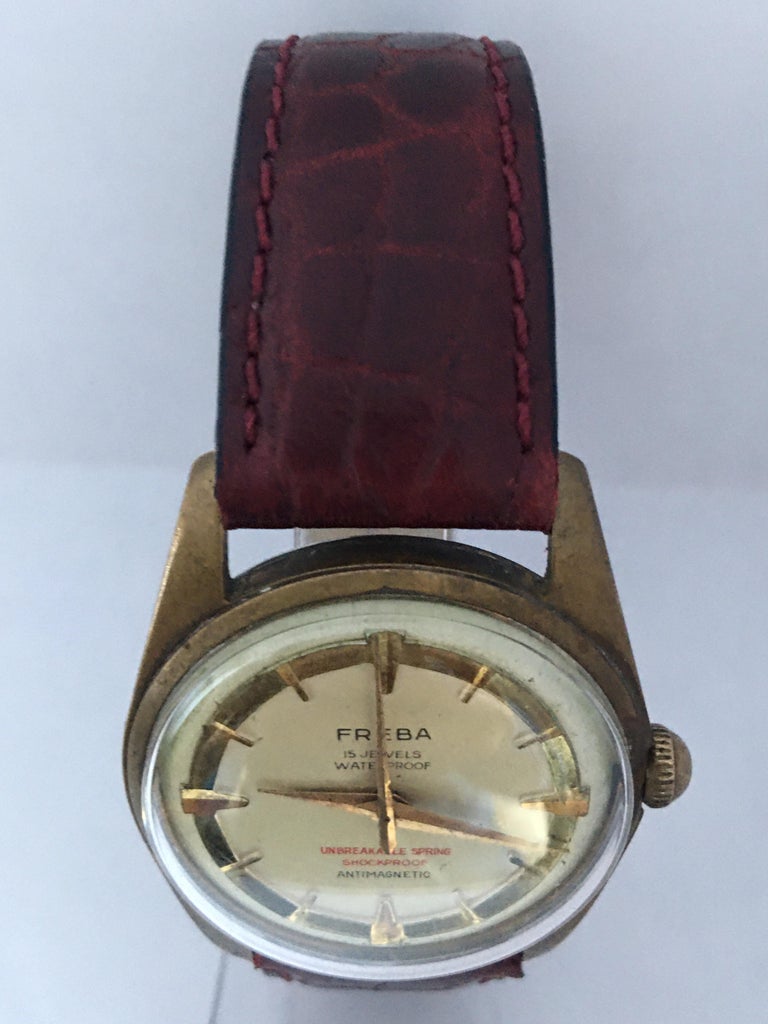 Vintage 1960s GoldPlated and Stainless Steel Back Mechanical Watch For Sale at 1stDibs