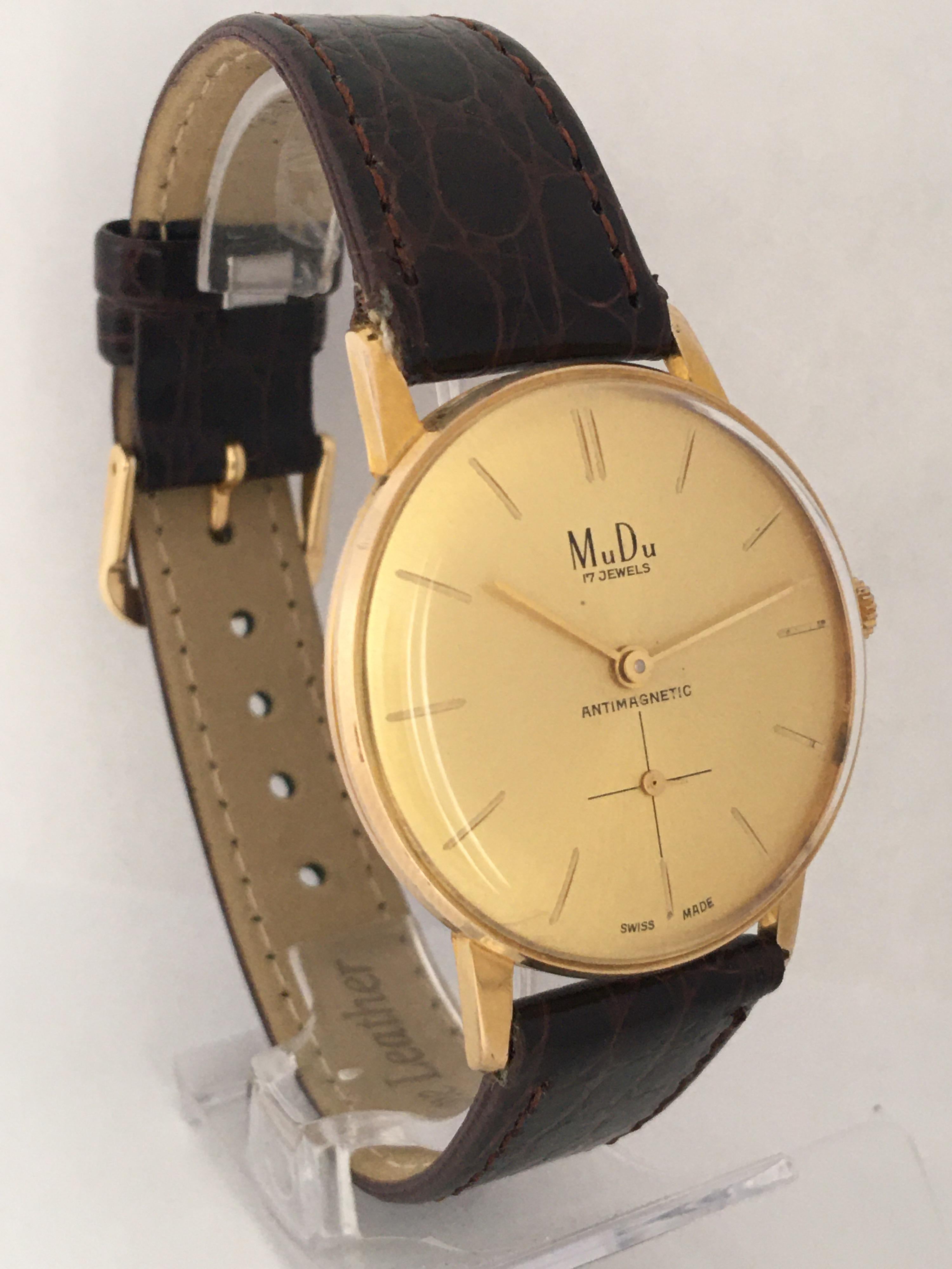 This beautiful pre-owned gold plated dial 34mm diameter classic hand winding watch is in good working condition and it is running well. Visible signs of ageing and wear with tiny light scratches on the glass and on the watch case as shown. 

Please