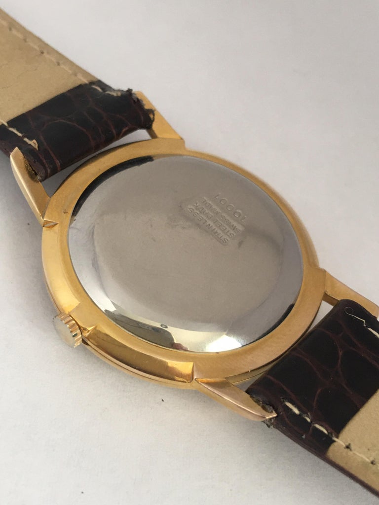 Vintage 1960s GoldPlated and Stainless Steel Back Swiss Mechanical Watch For Sale at 1stDibs