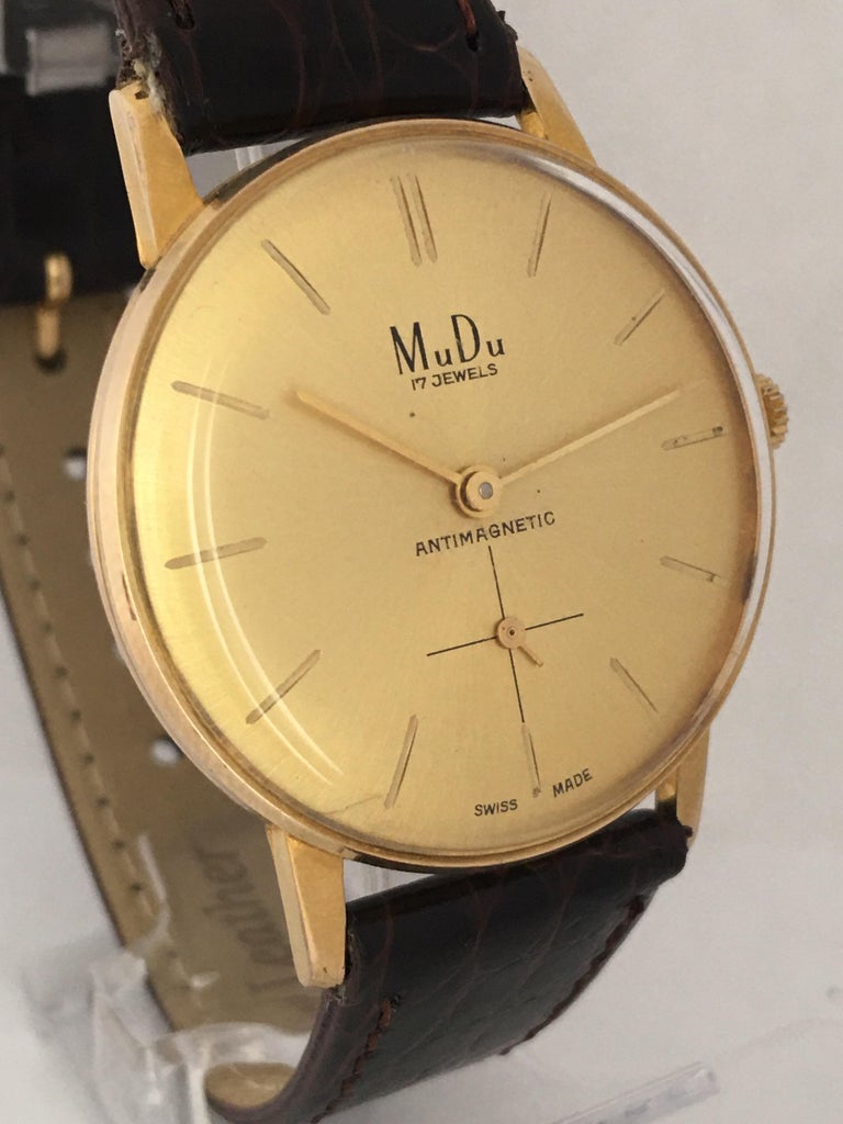 Vintage 1960s GoldPlated and Stainless Steel Back Swiss Mechanical Watch For Sale at 1stDibs