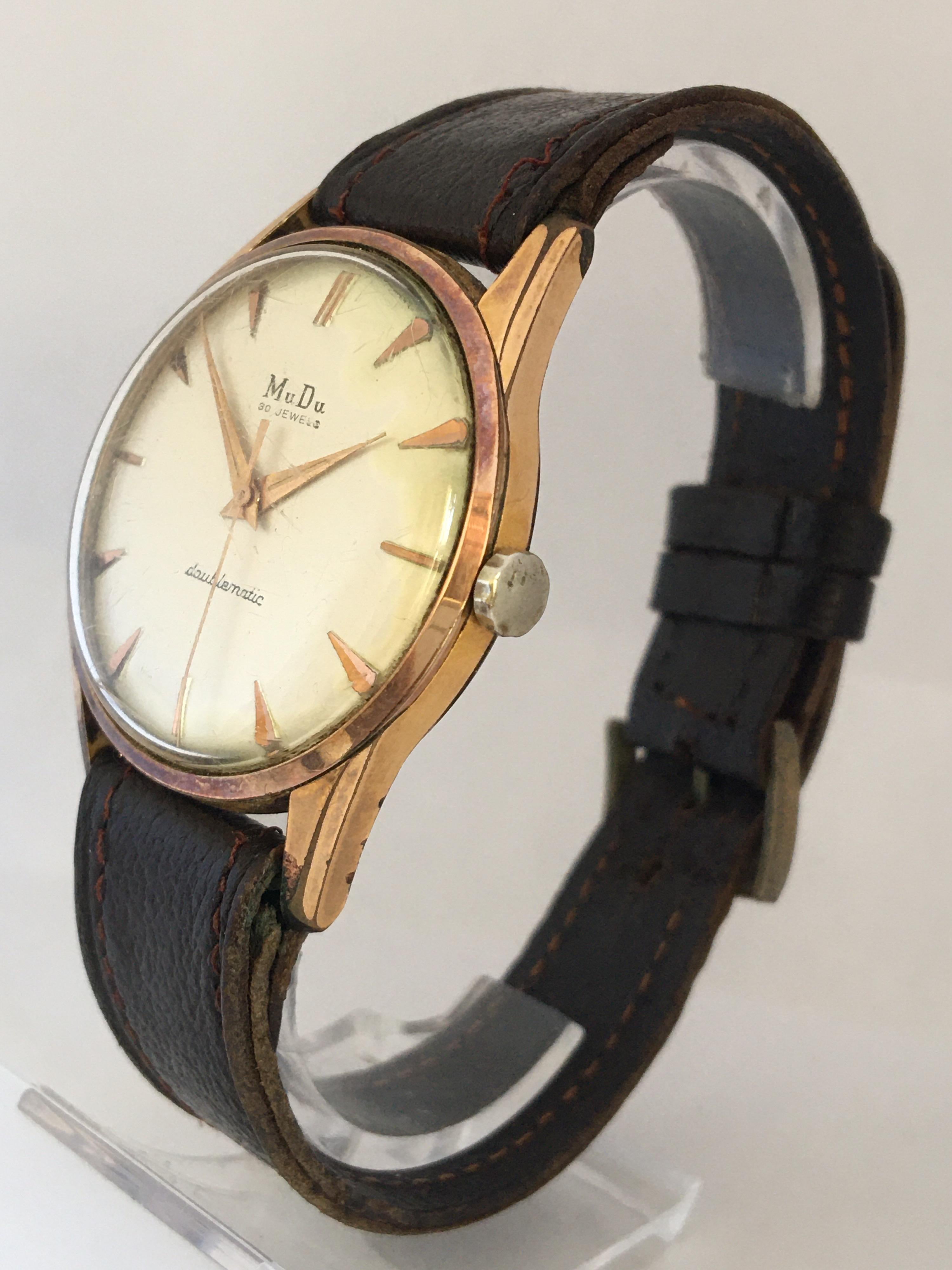 Vintage 1960s Gold-Plated Cap and Stainless Steel Back Swiss Automatic Watch For Sale 6