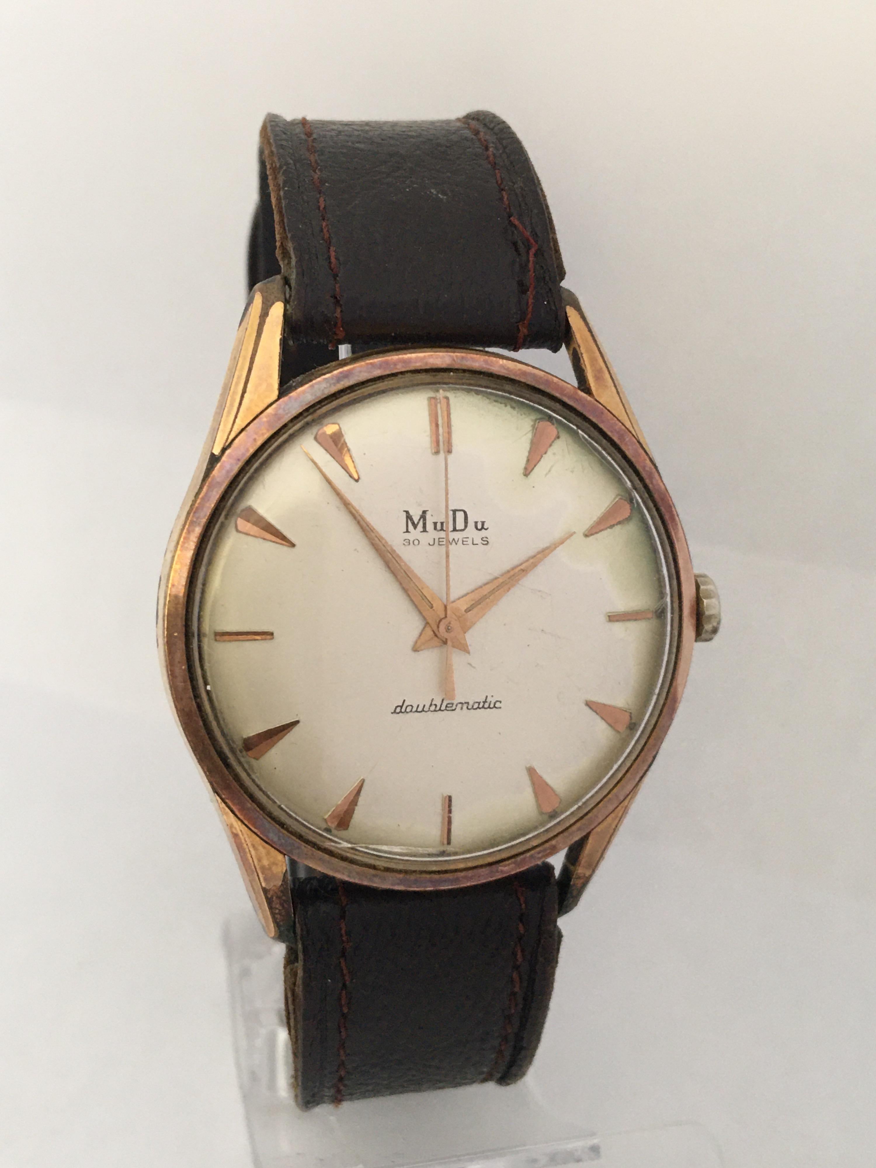 Vintage 1960s Gold-Plated Cap and Stainless Steel Back Swiss Automatic Watch For Sale 7