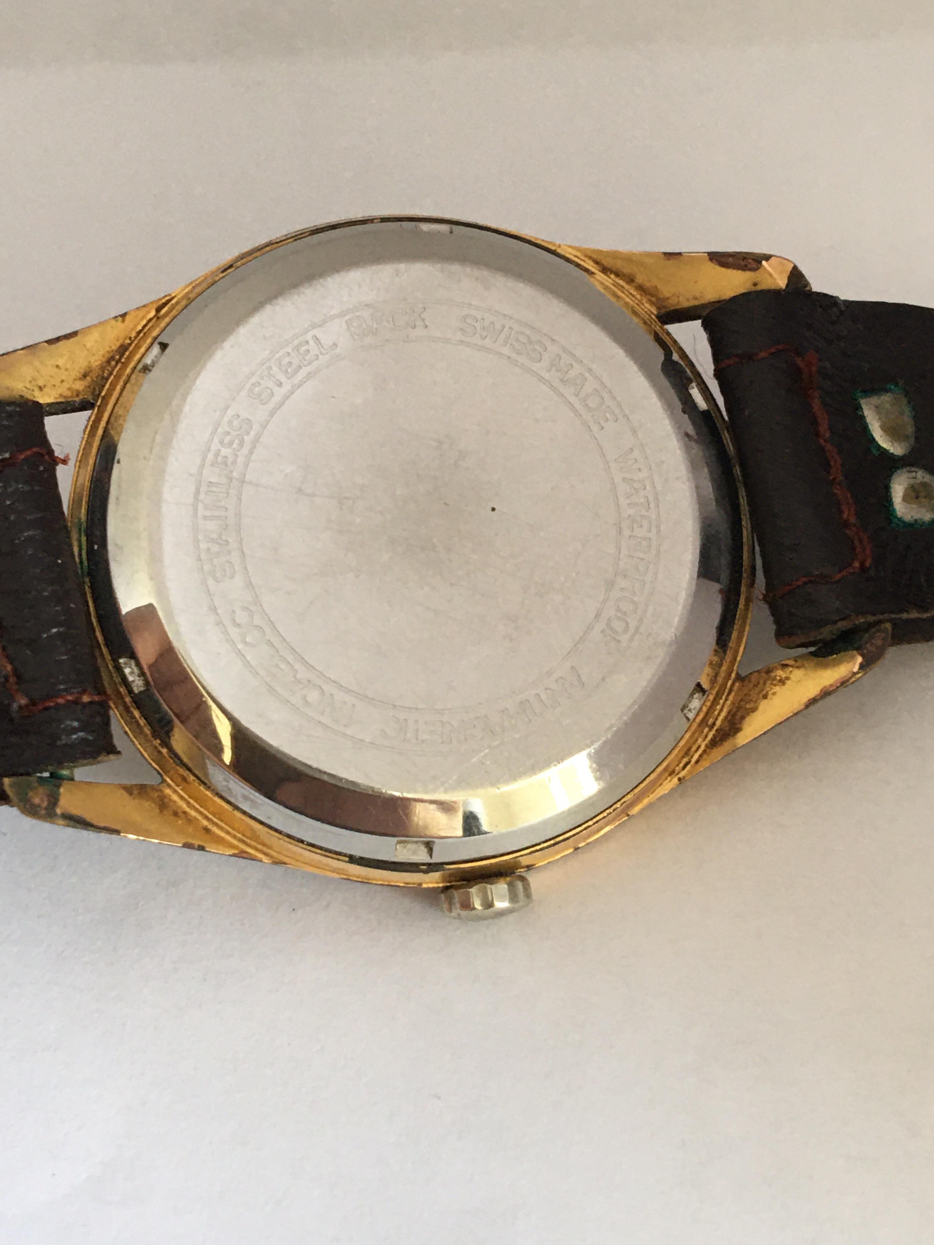 Vintage 1960s Gold-Plated Cap and Stainless Steel Back Swiss Automatic Watch For Sale 1