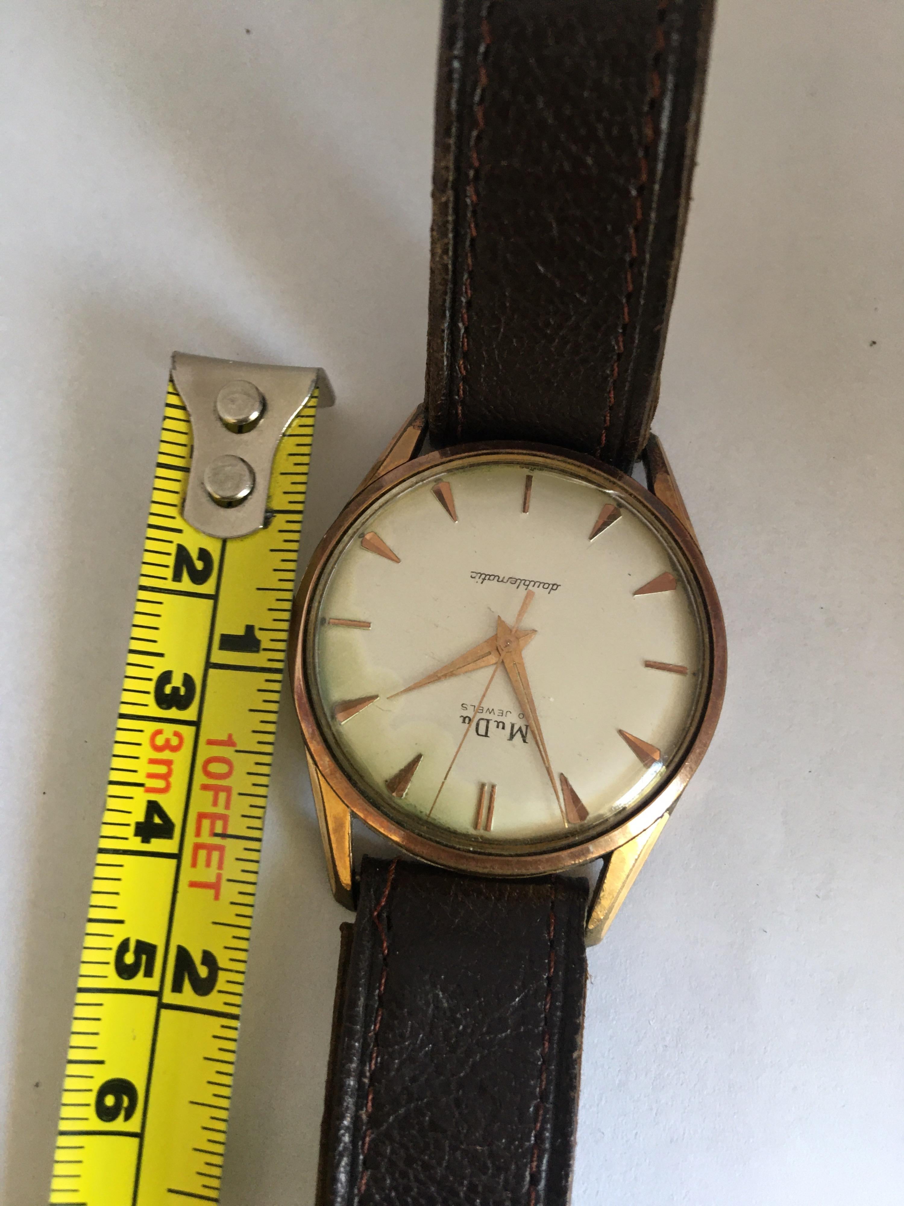 Vintage 1960s Gold-Plated Cap and Stainless Steel Back Swiss Automatic Watch For Sale 2