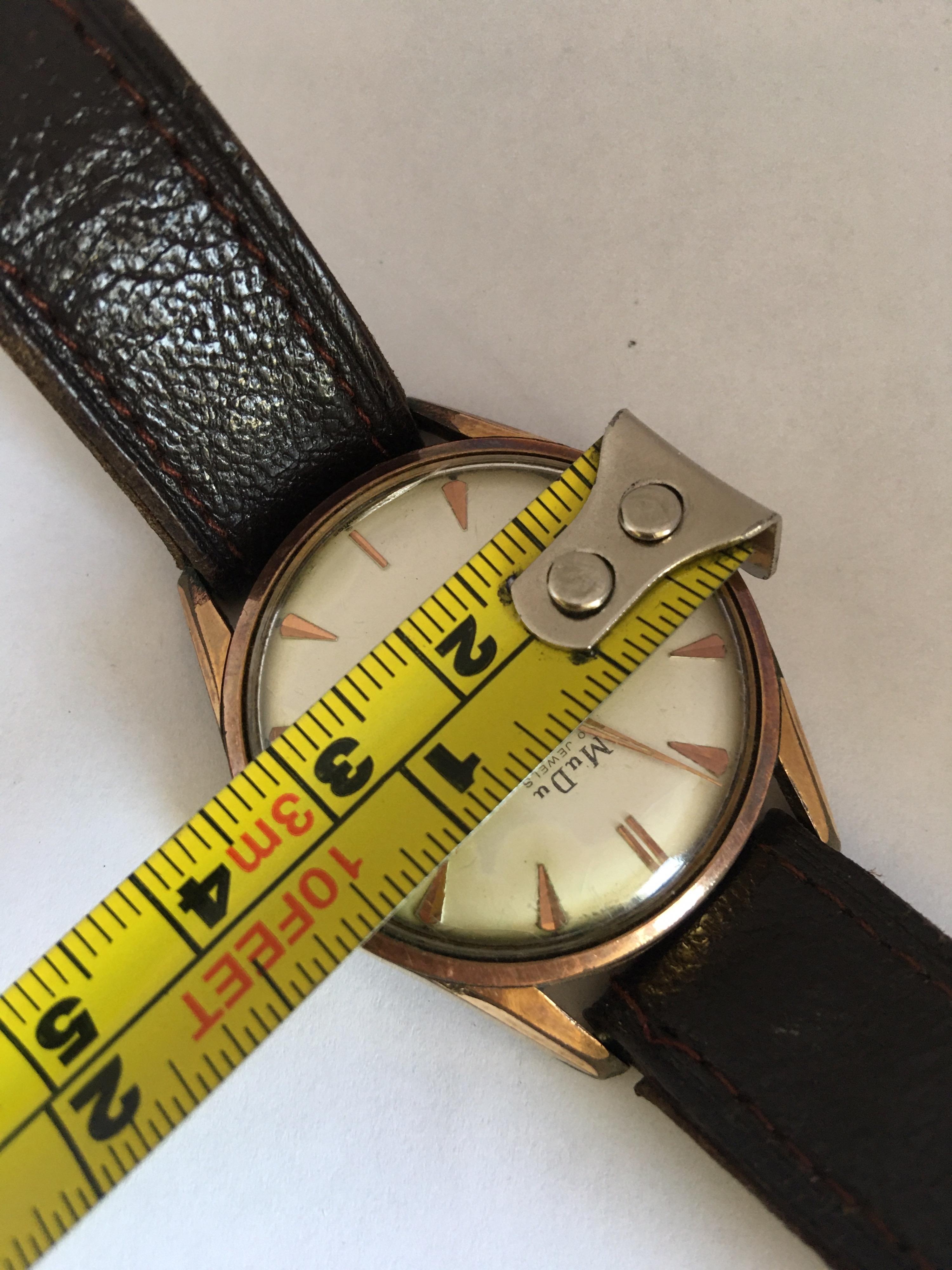 Vintage 1960s Gold-Plated Cap and Stainless Steel Back Swiss Automatic Watch For Sale 3