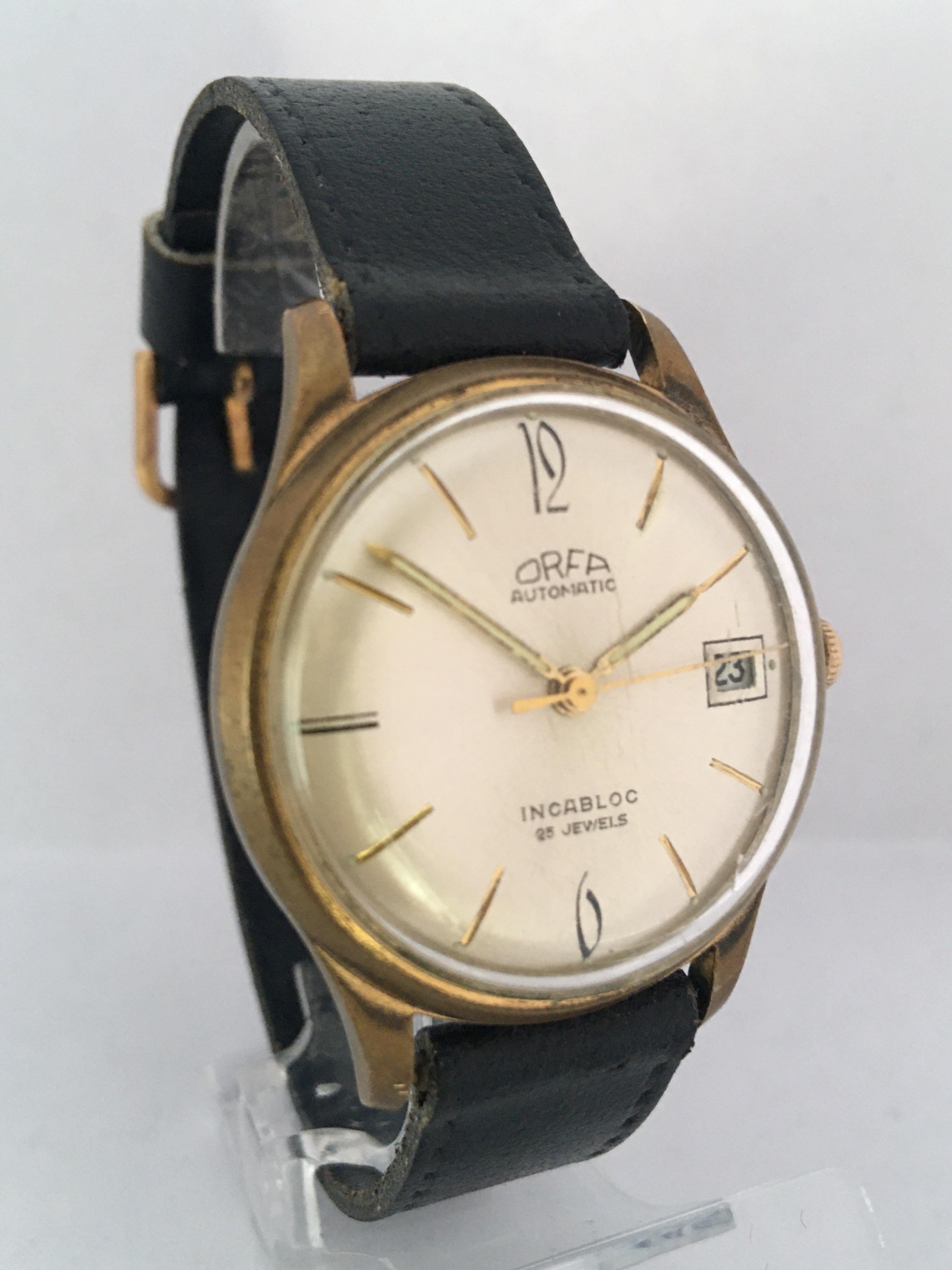 This beautiful vintage pre-owned automatic watch is in good working condition and it is running well (keeps a good time) visible signs of ageing and wear with visible scratches on the glass surface and on the watch case as shown. The watch bessel