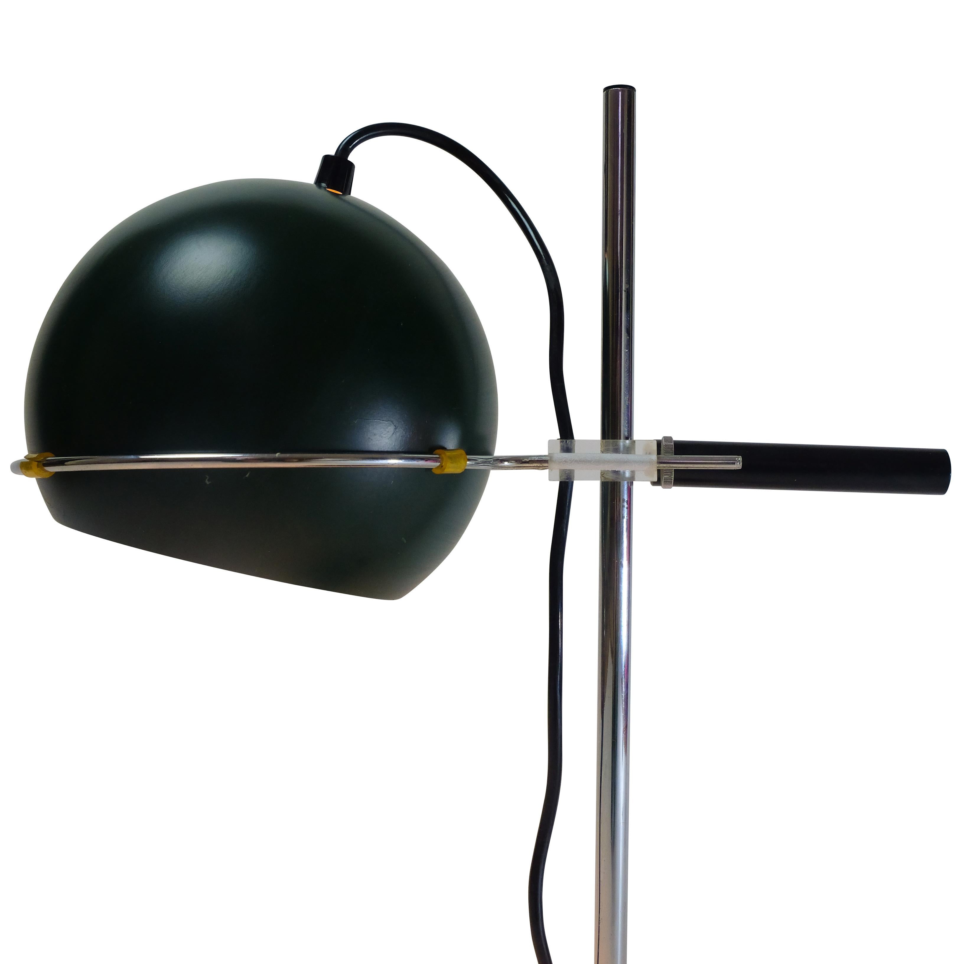 Vintage desk lamp designed and produced by Gepo, an Amsterdam-based company started in the 1960s.

The lamp is executed in beautiful dark green metal and polished chrome, wonderful stylish addition to any desk setting.