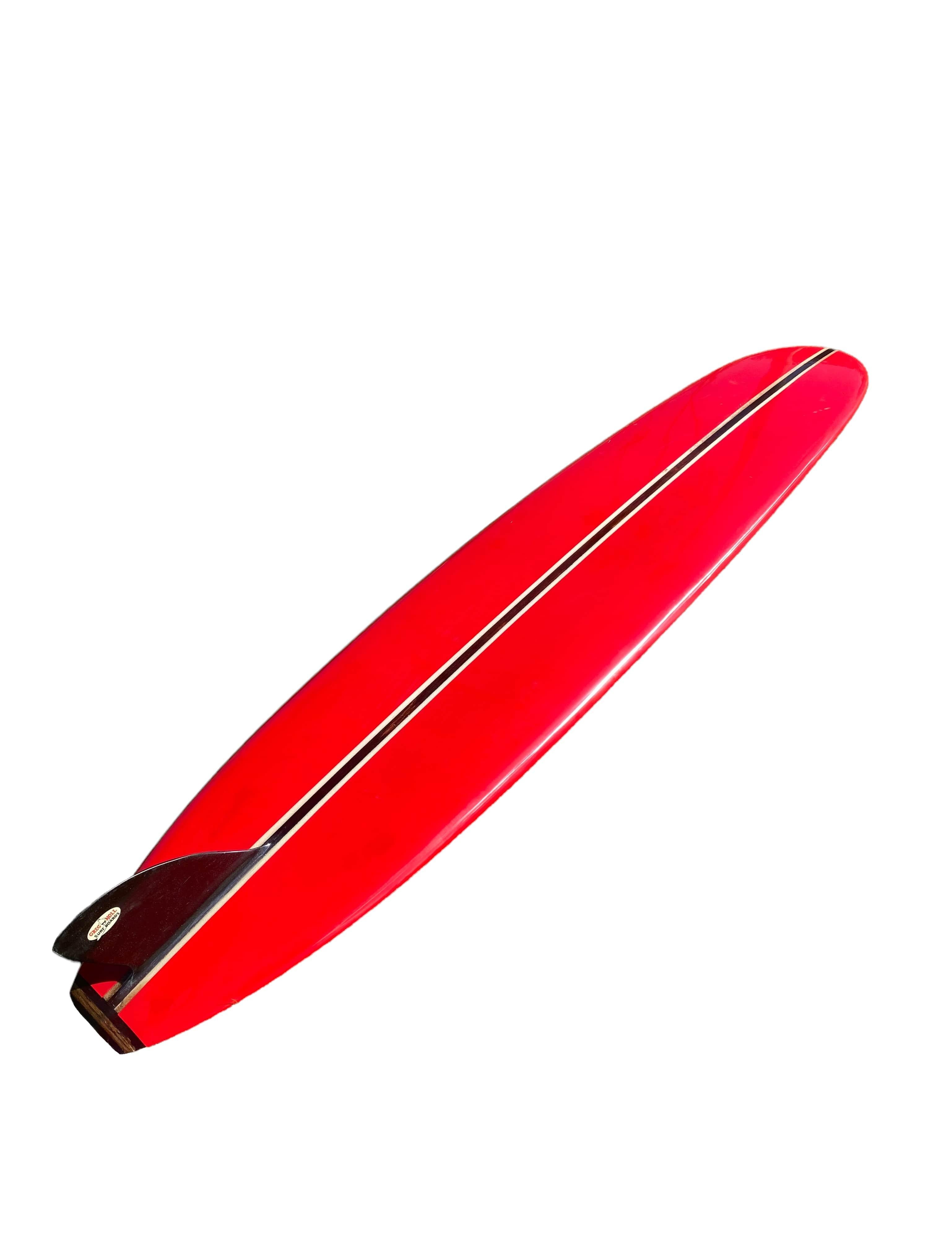 1960s Vintage Greg Noll classic longboard made between 1963-1964. Features gorgeous yellow panels and red wrapped rails with matching accents. Redwood single stringer with multi-piece wood tail block complimented by a sleek black D-fin. A remarkable