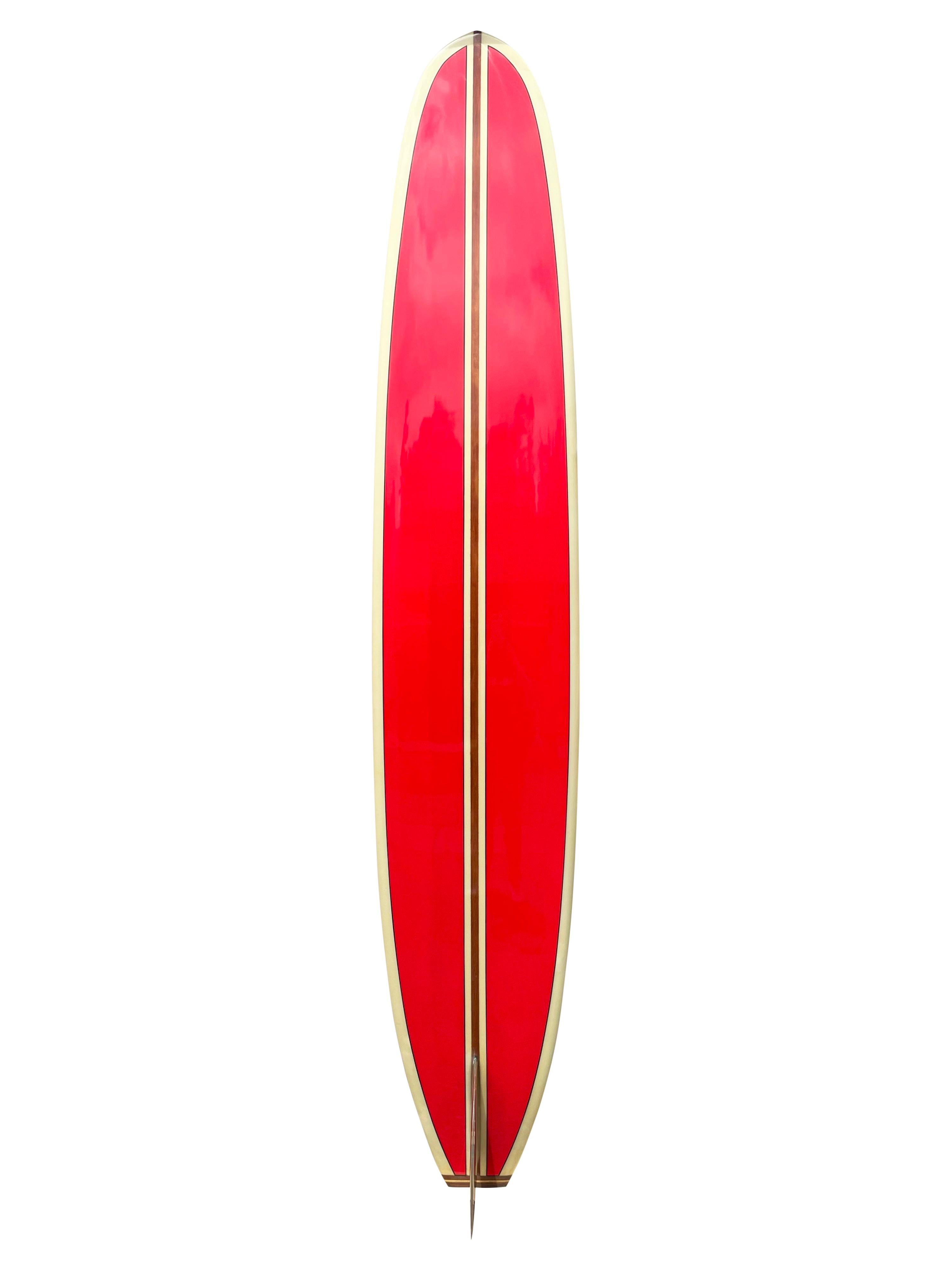 1960s Vintage Greg Noll “S” stringer model longboard. Features beautiful black/red color scheme with unique curved redwood “S” style stringers. Beautiful redwood and balsa Greg Noll signature “chopstick” fin complete with wood tailblock. Shaped