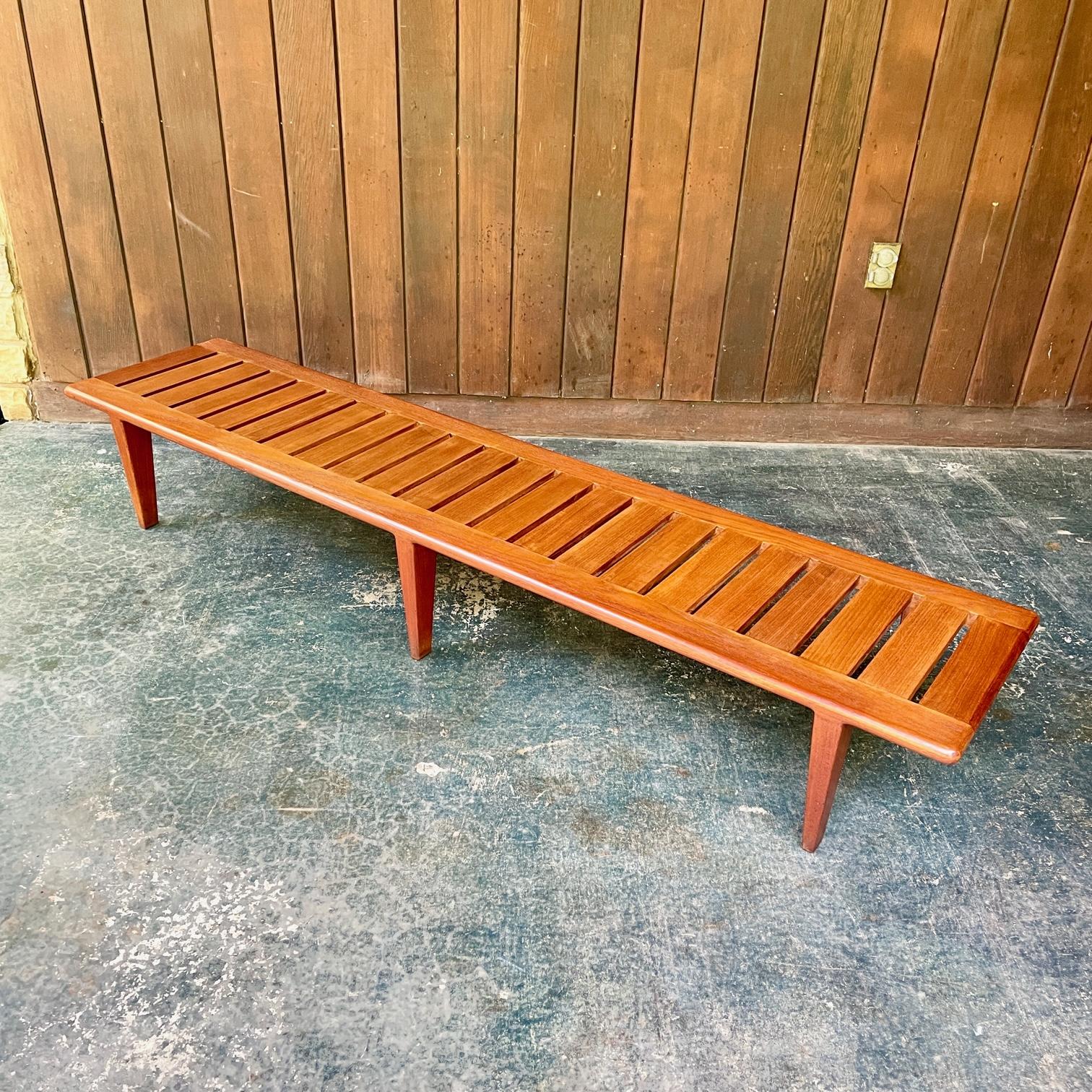 This is the largest Model JH-574 Bench. In the original finish. Showing wear from use. All joinery is tight, and this bench is ready to use. Also has a nice neat full burnished label. Pillows shown are not included. 

L 76.75 x W 16.75 x H 11.75