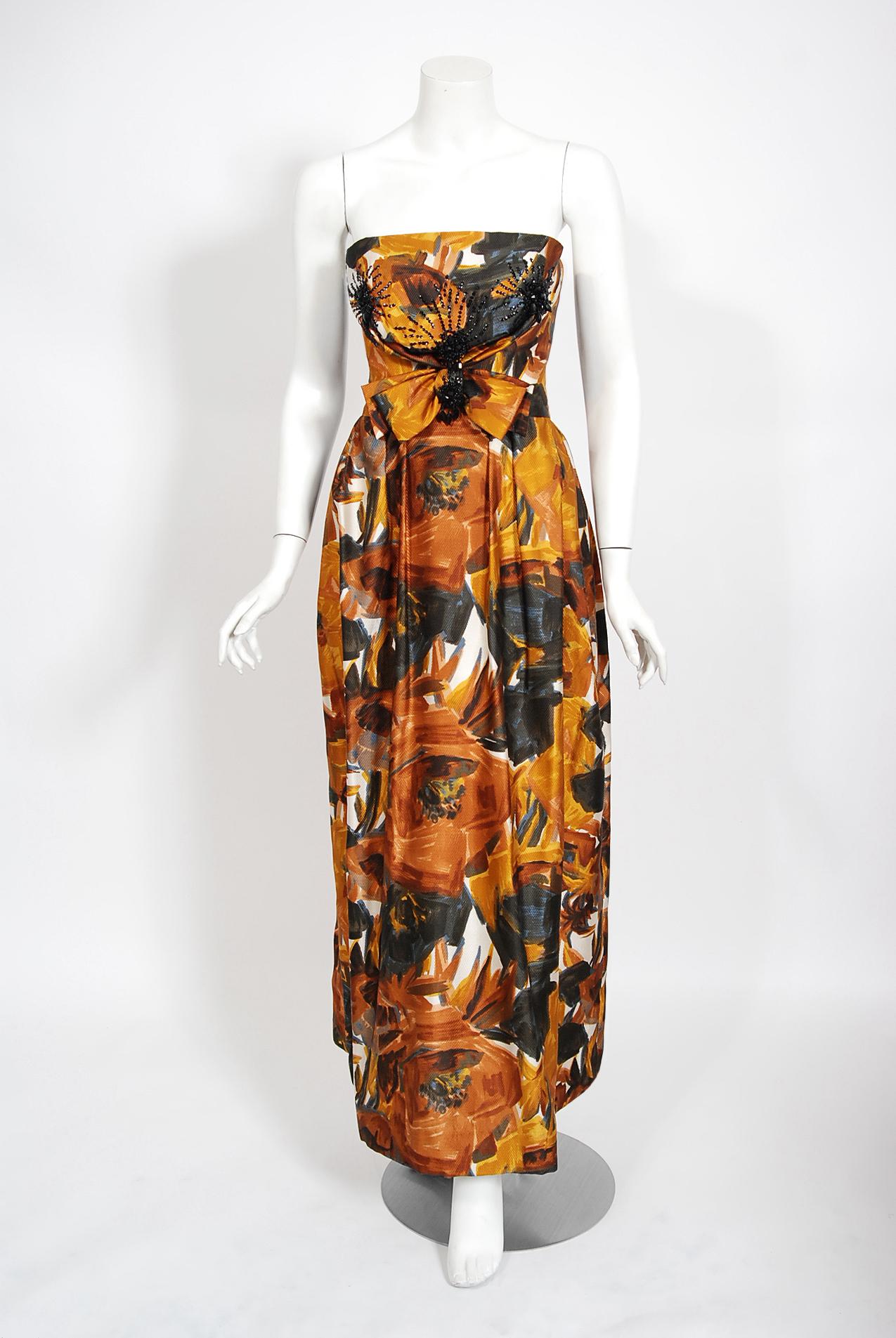 Gorgeous Helena Barbieri marigold roses floral print gown dating back to the early 1960's. Creations by Helena Barbieri are sought after by savvy collectors who appreciate high-quality construction and attention to detail. Barbieri's work is often