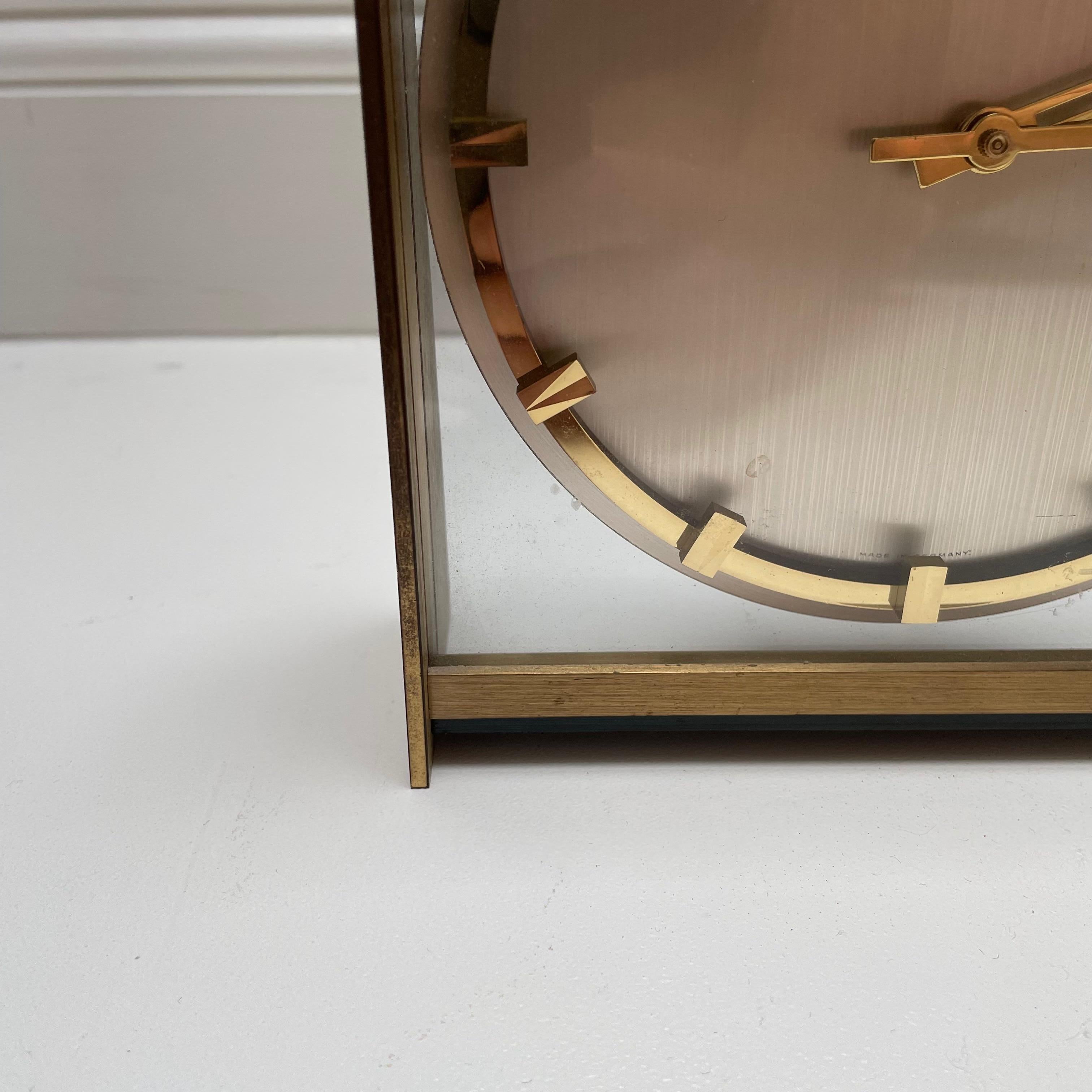 Metal Vintage 1960s Hollywood Regency Brass Glass Table Clock by Kienzle, Germany For Sale