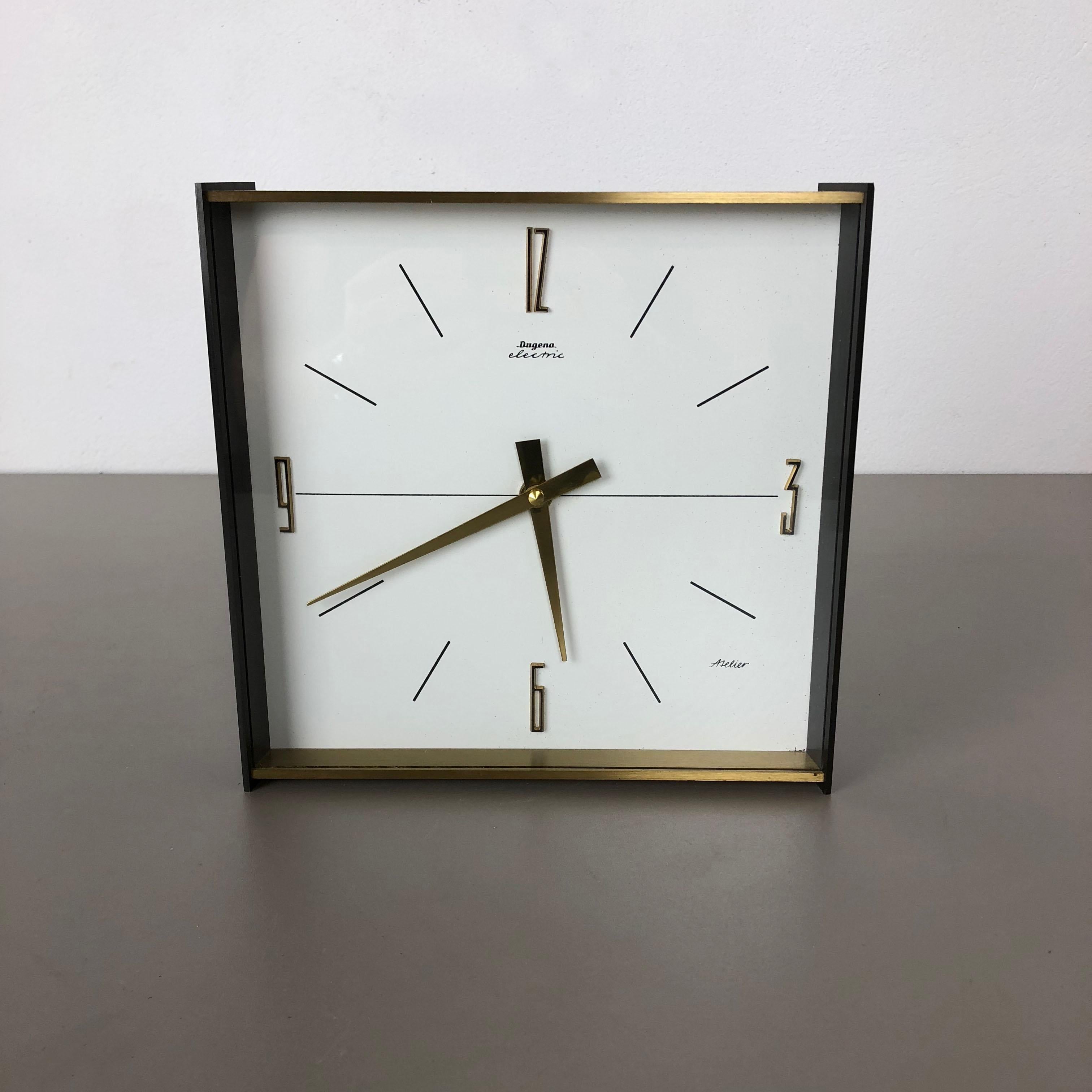 Article:

Table clock, wall clock



Origin:

Germany


Producer:

Dugena Electric, Germany


Age:

1960s



Description:

This original vintage table clock was produced in the 1960s by the premium clock producer Dugena in