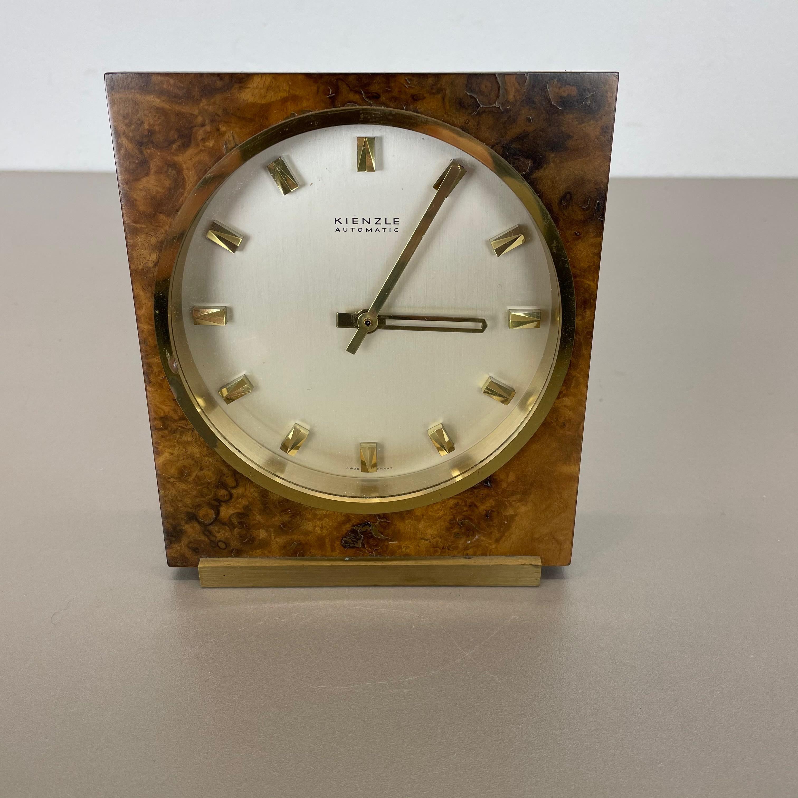 Article:

Table clock



Origin:

Germany


Producer:

Kienzle, Germany


Age:

1960s



This original vintage table clock was produced in the 1960s by the premium clock producer Kuienzle in Germany. The clock is original