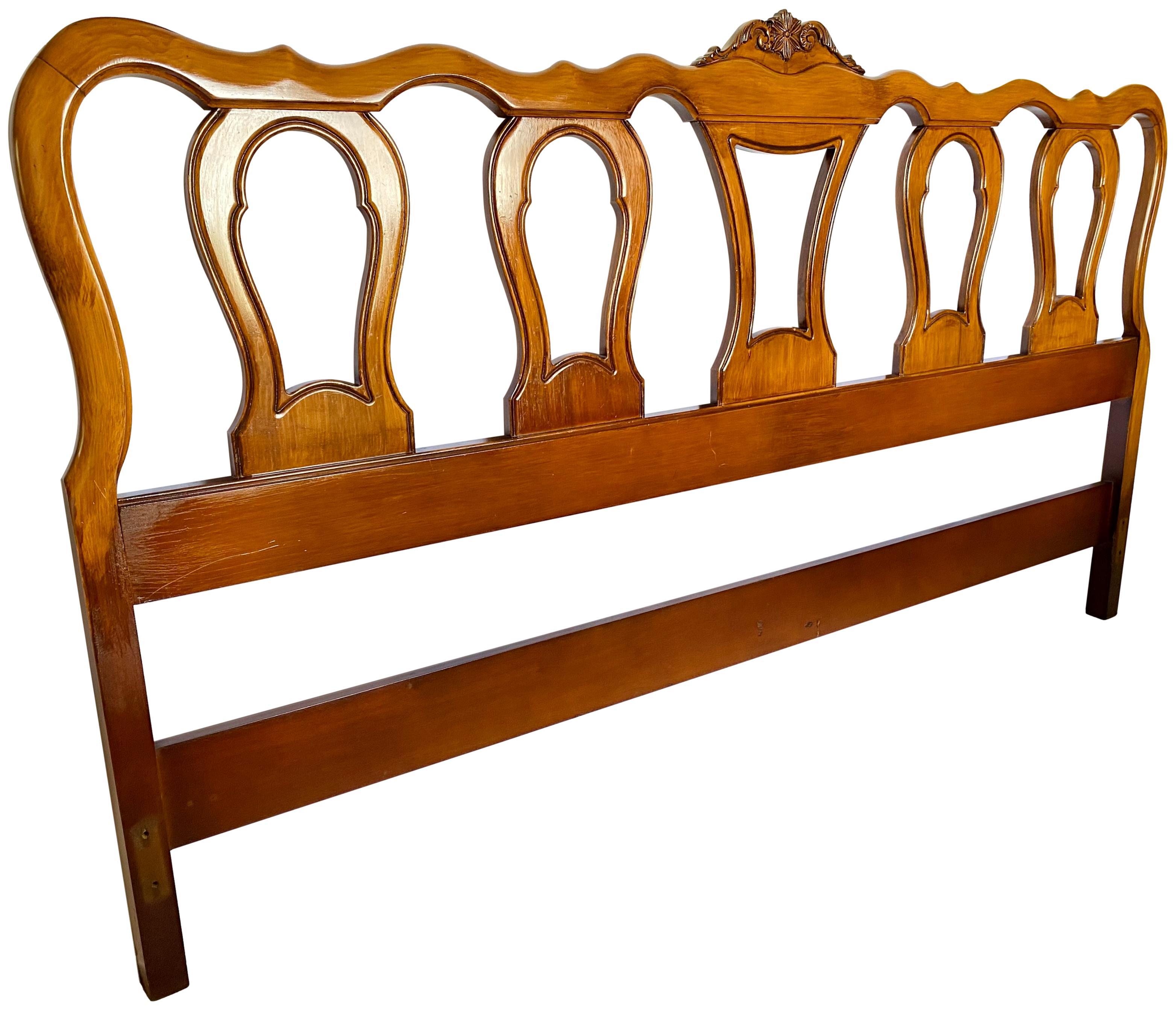 A vintage 1960's French provincial carved wood king headboard.

Dimensions: 78 W x 2