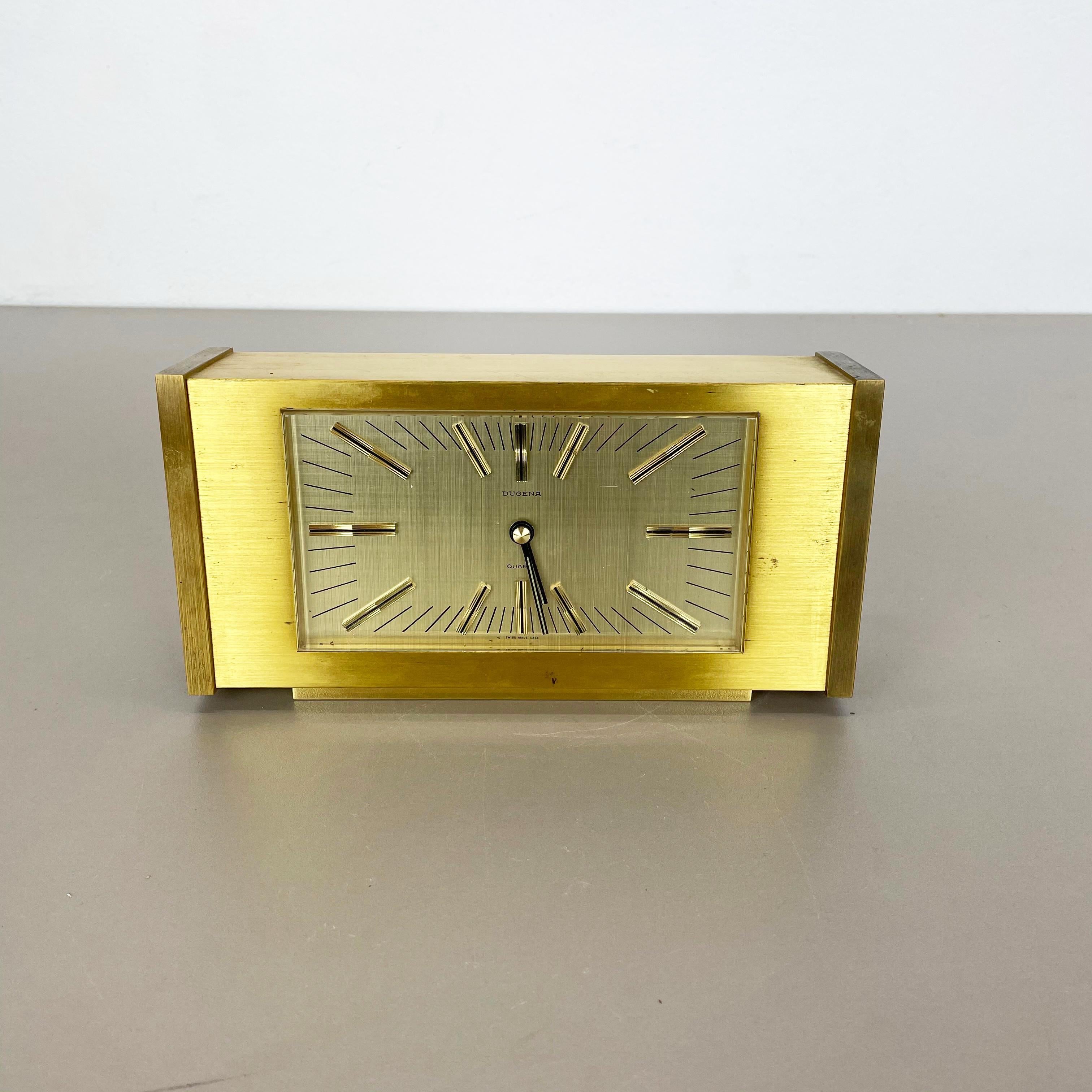 Article:

Very heavy solid brass table clock



Origin:

Switzerland and Germany


Producer:

Dugena Electric


Age:

1960s





This original vintage table clock was produced in the 1960s by the premium clock producer