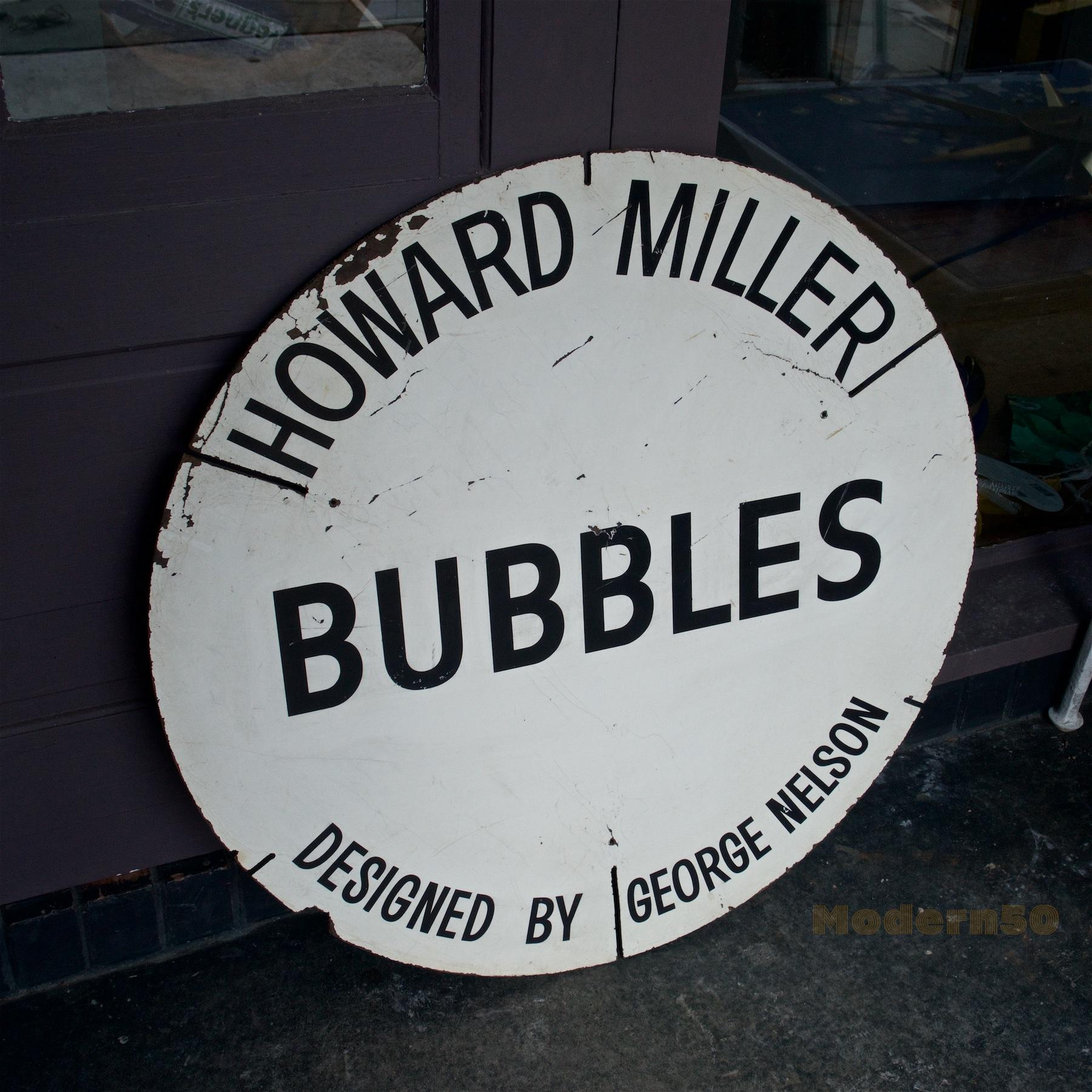 Heavily worn and damaged bubble display store prop, now patinated wall art.