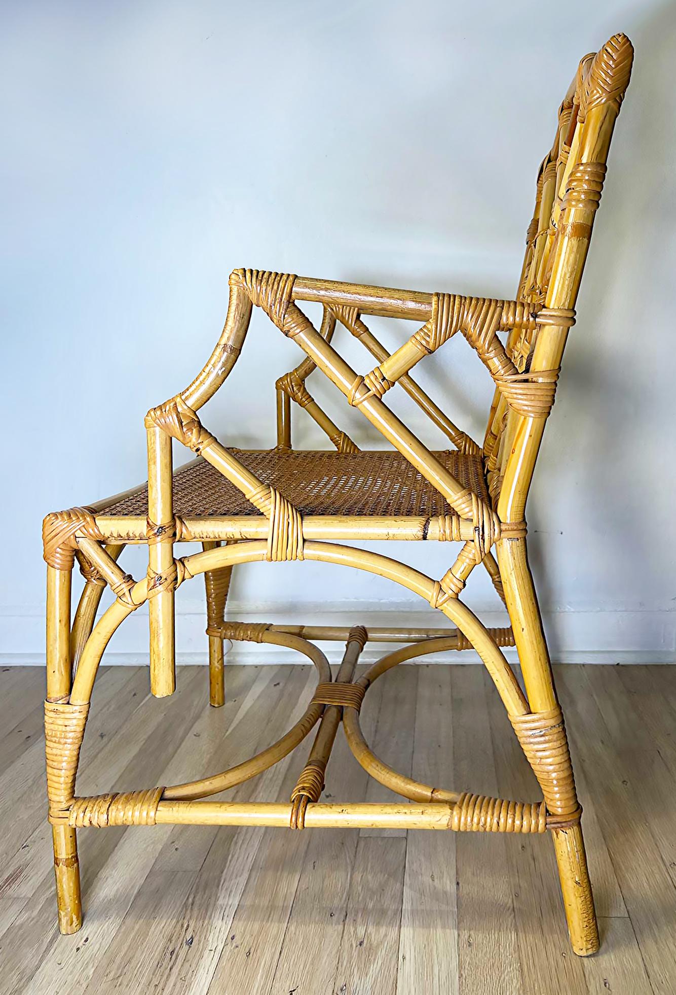 Vintage 1960s Italian Rattan Chinese Chippendale Style Chair

Offered for sale is a 1960s Italian rattan Chinese Chippendale-style chair
created with the Iconic Chinese Chippendale lattice work back. The seat is caned and is in very good original